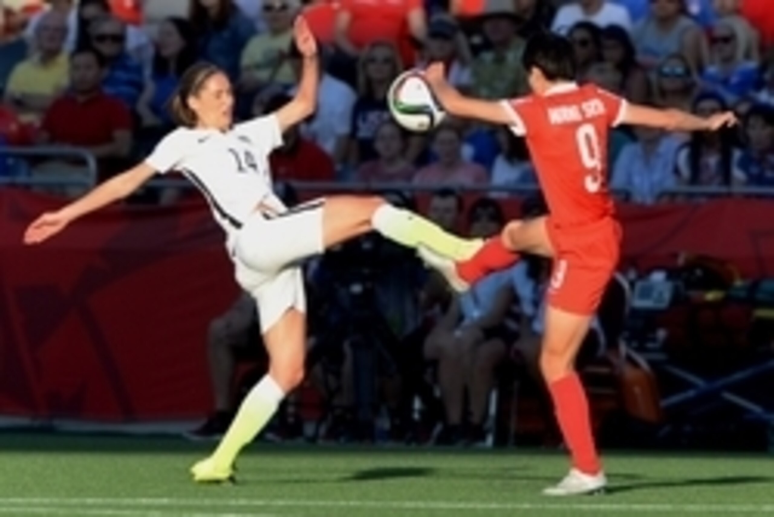 Jun 26, 2015; Ottawa, Ontario, CAN; United States midfielder Morgan Brian (14) and China defender Wang Shanshan (9) battle for the ball during the first half in the quarterfinals of the FIFA 2015 Women's World Cup at Lansdowne Stadium. Mandatory Credit: M Jun 26, 2015; Ottawa, Ontario, CAN; United States midfielder Morgan Brian (14) and China defender Wang Shanshan (9) battle for the ball during the first half in the quarterfinals of the FIFA 2015 Women's World Cup at Lansdowne Stadium. Mandatory Credit: M