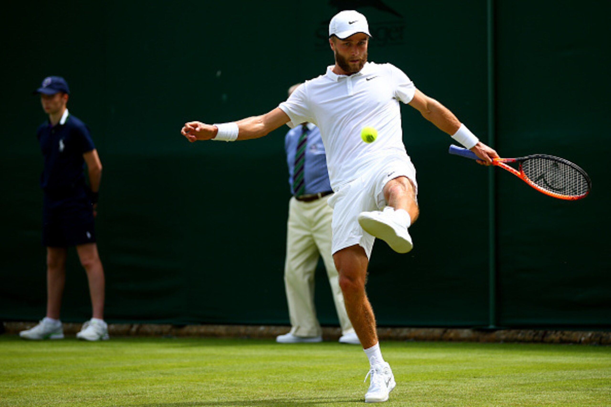 LONDON, ENGLAND - JUNE 29:  Liam Broady of Great Britain in action against Marinko Matosevic of Australia in their Gentlemen's Singles match during day one of the Wimbledon Lawn Tennis Championships at the All England Lawn Tennis and Croquet Club on June 