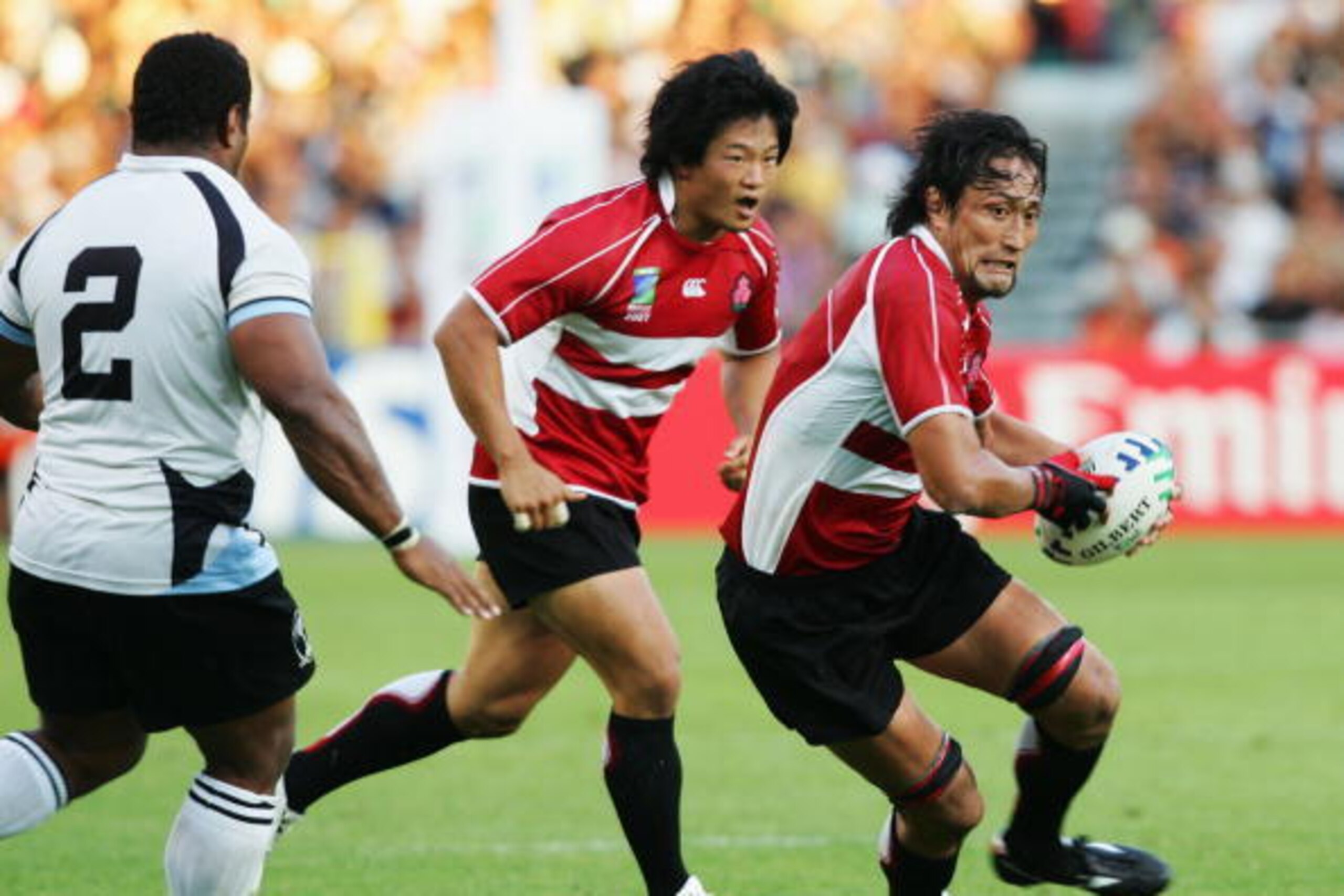 TOULOUSE, FRANCE - SEPTEMBER 12: Hitoshi Ono of Japan runs with the ball during the Rugby World Cup 2007 Pool B match between Japan and Fiji at Le Stade on September 12, 2007 in Toulouse, France.  (Photo by Warren Little/Getty Images)