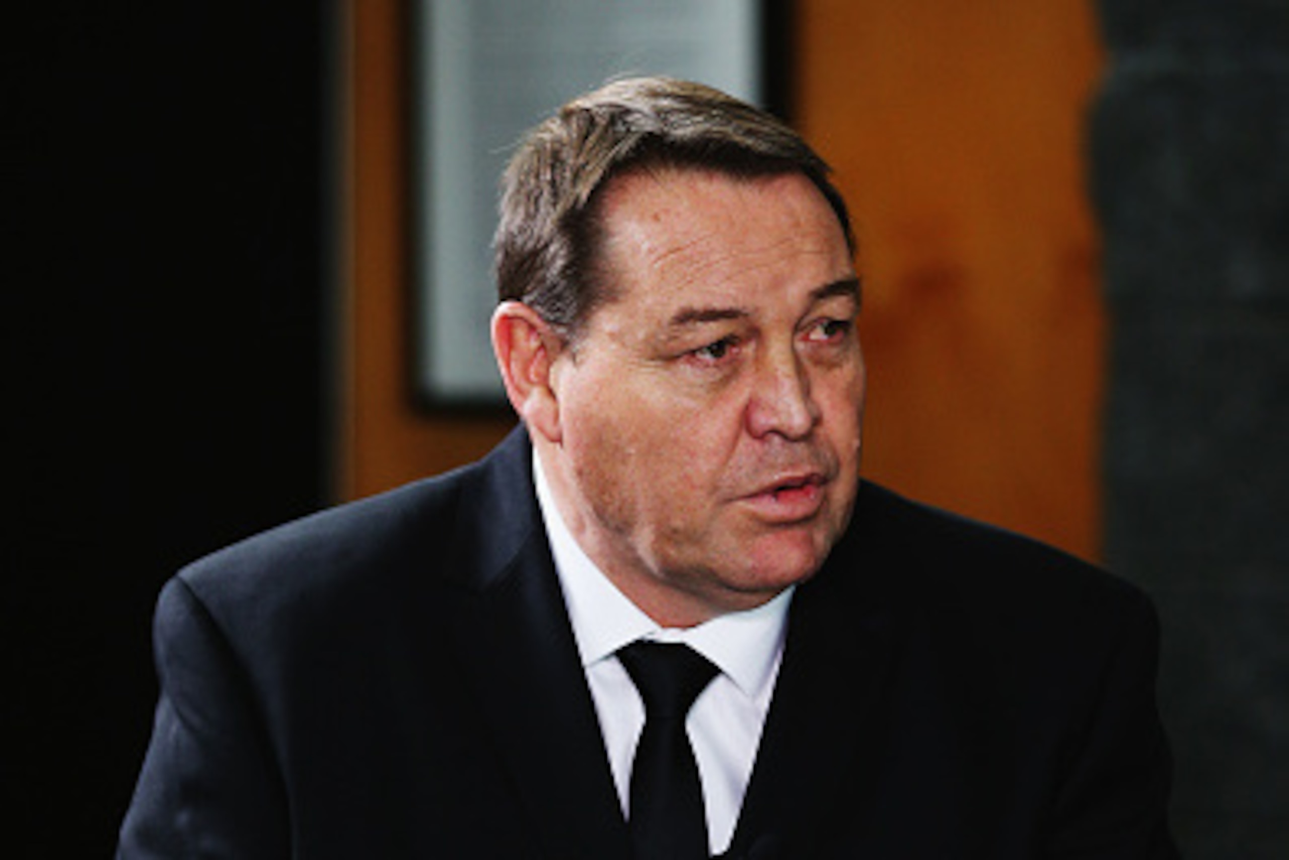 AUCKLAND, NEW ZEALAND - JUNE 21:  All Blacks head coach Steve Hansen is interviewed on radio during the New Zealand All Blacks 2015 International season squad announcement at Auckland Grammar School on June 21, 2015 in Auckland, New Zealand.  (Photo by Ha