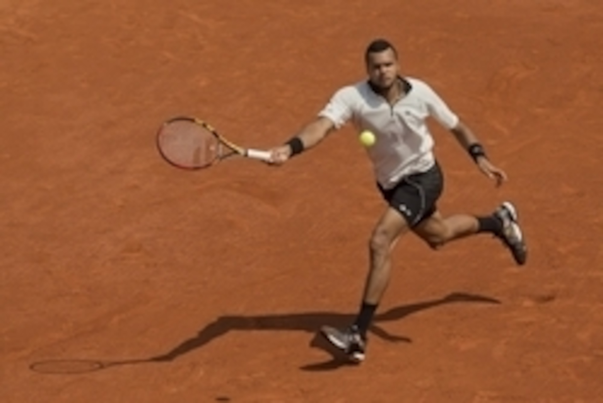 Jun 5, 2015; Paris, France; Jo-Wilfried Tsonga (FRA) in action during his match against Stanislas Wawrinka (SUI) on day 13 of the 2015 French Open at Roland Garros. Mandatory Credit: Susan Mullane-USA TODAY Sports Jun 5, 2015; Paris, France; Jo-Wilfried Tsonga (FRA) in action during his match against Stanislas Wawrinka (SUI) on day 13 of the 2015 French Open at Roland Garros. Mandatory Credit: Susan Mullane-USA TODAY Sports