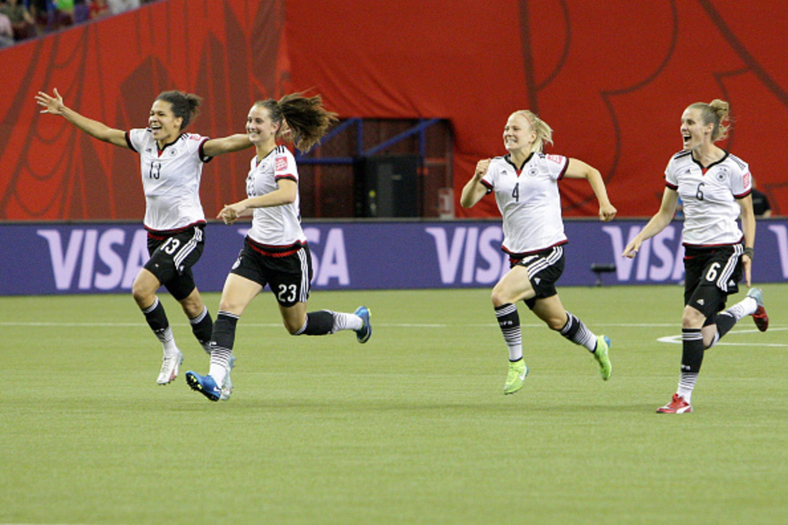 MONTREAL, QC - JUNE 27: Team Germany run as they celebrate their win over France during the FIFA Women's World Cup Canada 2015 quarter final match between Germany and France at Olympic Stadium on June 27, 2015 in Montreal, Canada.  (Photo by Francois Lapl