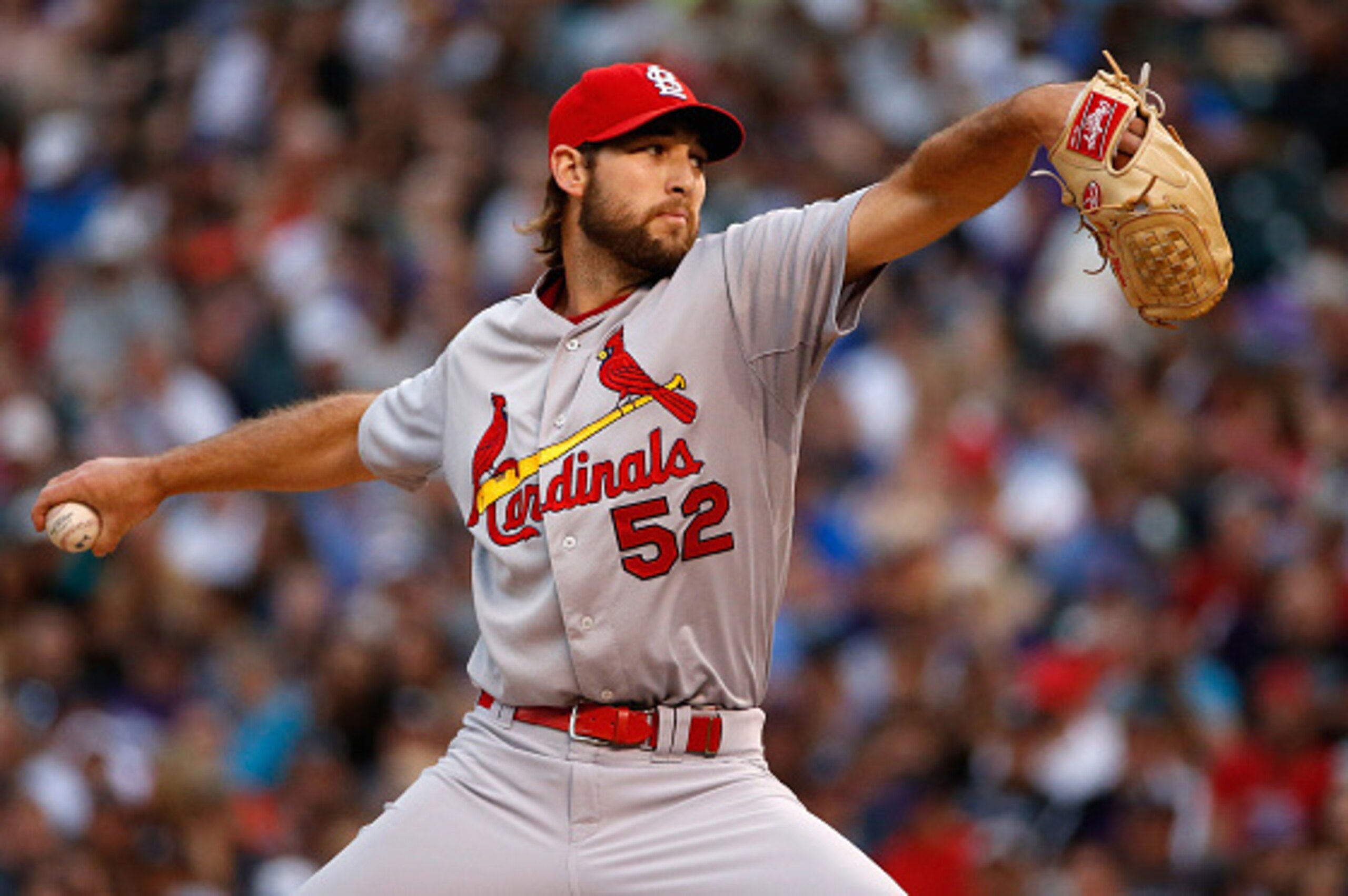 DENVER, CO - JUNE 09:  Starting pitcher Michael Wacha #52 of the St. Louis Cardinals delivers against the Colorado Rockies at Coors Field on June 9, 2015 in Denver, Colorado.  (Photo by Doug Pensinger/Getty Images)