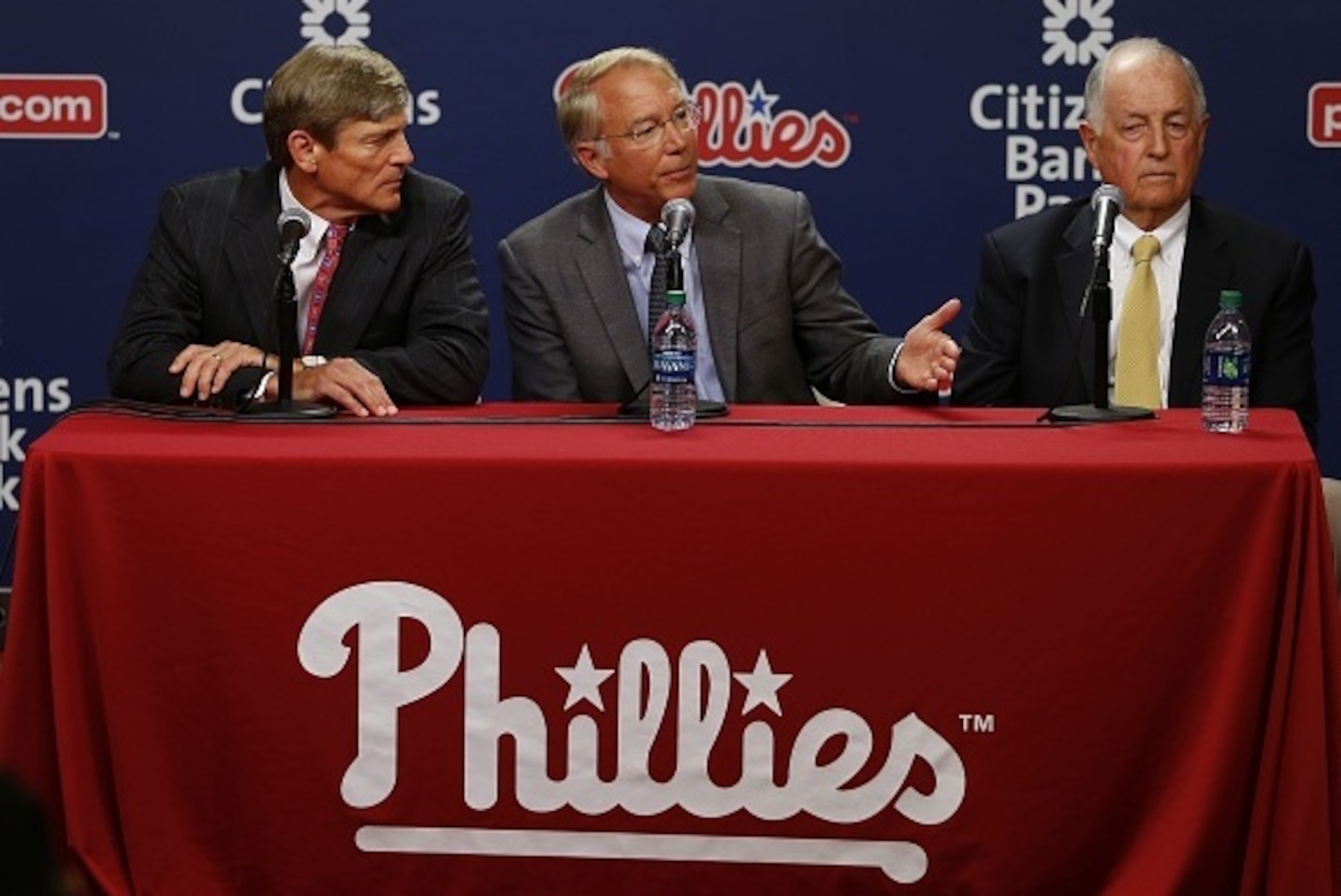 PHILADELPHIA, PA - JUNE 29: John Middletown, left, part owner of Philadelphia Phillies and president Pat Gillick, right, listen as Andy MacPhail, center, answers a question during a press conference at Citizens Bank Park on June 29, 2015 in Philadelphia, 