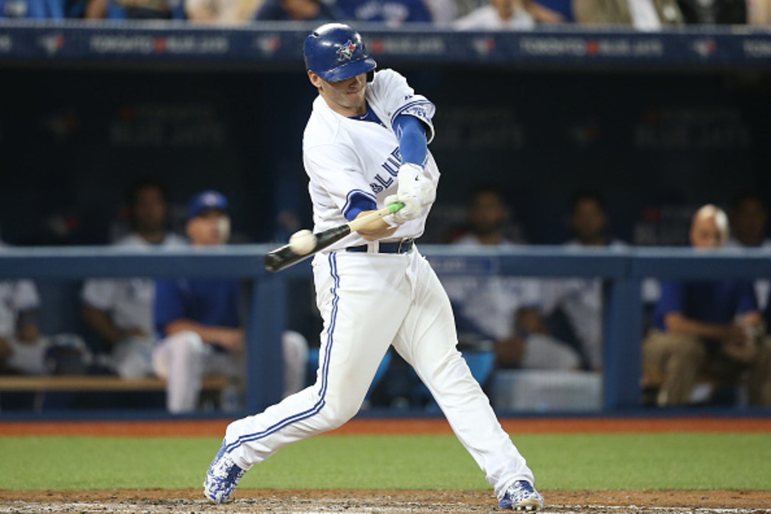TORONTO, CANADA - JUNE 18: Josh Donaldson #20 of the Toronto Blue Jays hits an RBI double in the fourth inning during MLB game action against the New York Mets on June 18, 2015 at Rogers Centre in Toronto, Ontario, Canada. (Photo by Tom Szczerbowski/Getty