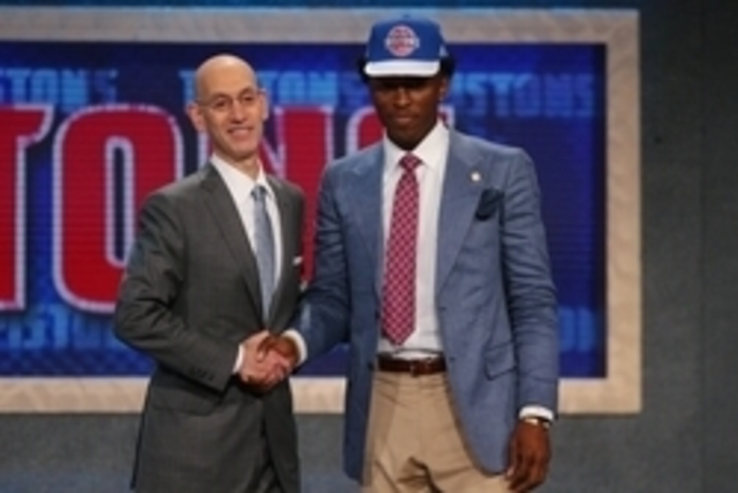 Jun 25, 2015; Brooklyn, NY, USA; Stanley Johnson (Arizona) greets NBA commissioner Adam Silver after being selected as the number eight overall pick to the Detroit Pistons in the first round of the 2015 NBA Draft at Barclays Center. Mandatory Credit: Brad