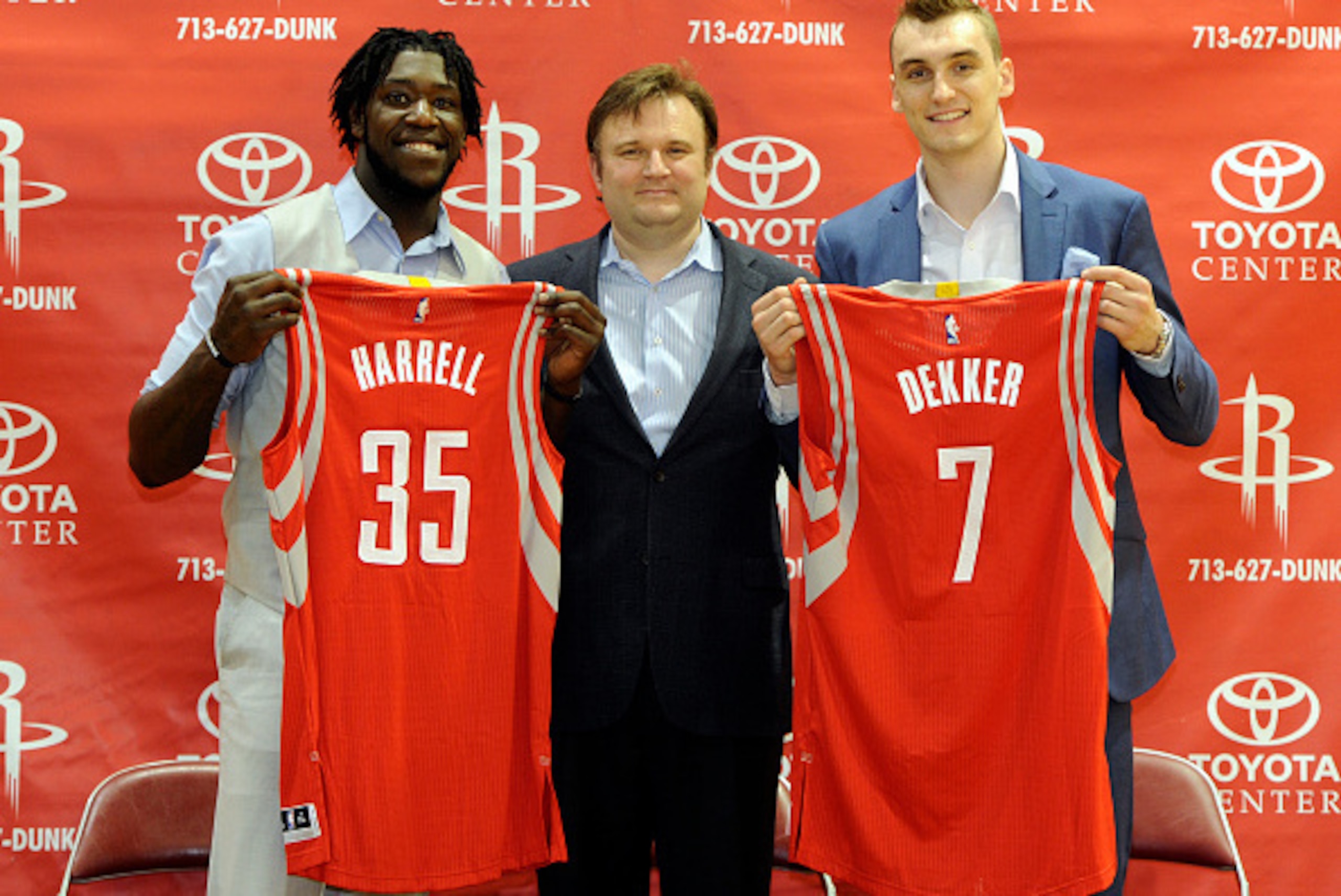 HOUSTON, TX- JUNE 27: 2015 NBA draft picks Montrezl Horrell, and Sam Dekker, and manager Daryl Morey pose for a portrait during a press conference on June 27, 2015 in Houston, TX. NOTE TO USER: User expressly acknowledges and agrees that, by downloading a