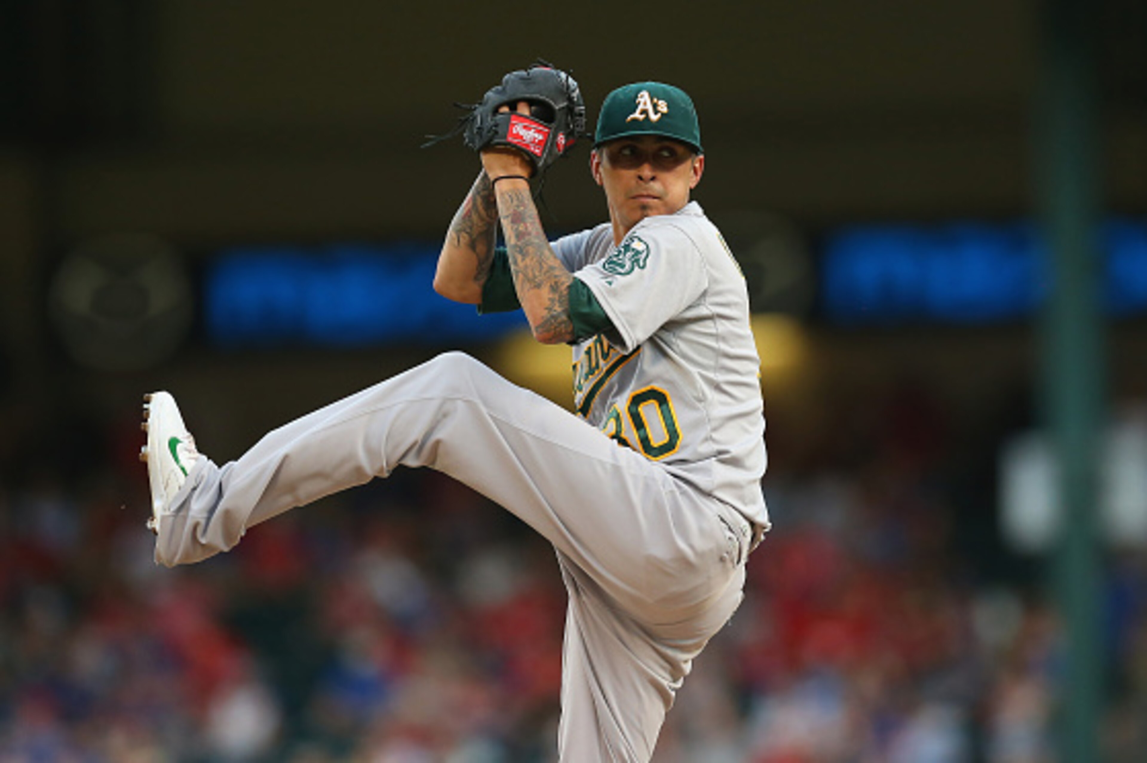 ARLINGTON, TX - JUNE 23: Jesse Chavez #30 of the Oakland Athletics throws against the Texas Rangers in the first inning at Globe Life Park in Arlington on June 23, 2015 in Arlington, Texas. (Photo by Ronald Martinez/Getty Images) ARLINGTON, TX - JUNE 23: Jesse Chavez #30 of the Oakland Athletics throws against the Texas Rangers in the first inning at Globe Life Park in Arlington on June 23, 2015 in Arlington, Texas. (Photo by Ronald Martinez/Getty Images)