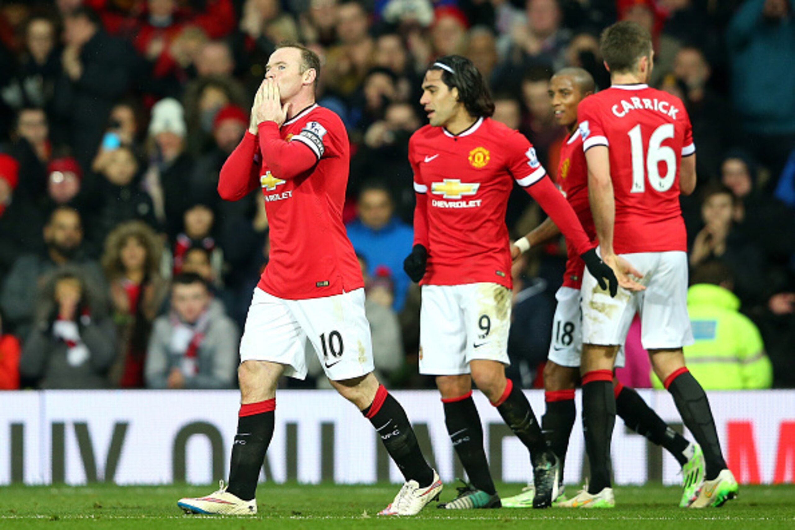 MANCHESTER, ENGLAND - DECEMBER 26:  Wayne Rooney of Manchester United celebrates scoring the second goal during the Barclays Premier League match between Manchester United and Newcastle United at Old Trafford on December 26, 2014 in Manchester, England.  