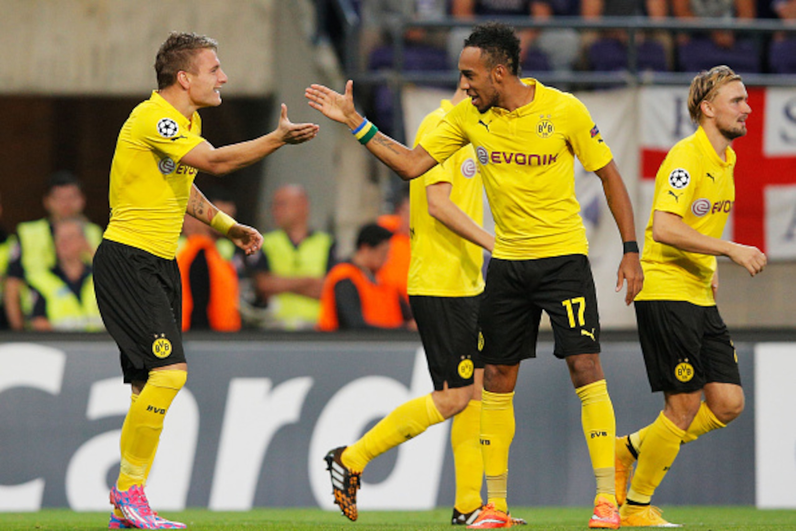 ANDERLECHT, BELGIUM - OCTOBER 01:  Ciro Immobile of Borussia Dortmund (L) celebrates with team mate Pierre-Emerick Aubameyang (17) as he scores their first goal during the UEFA Champions League Group D match between RSC Anderlecht and Borussia Dortmund at