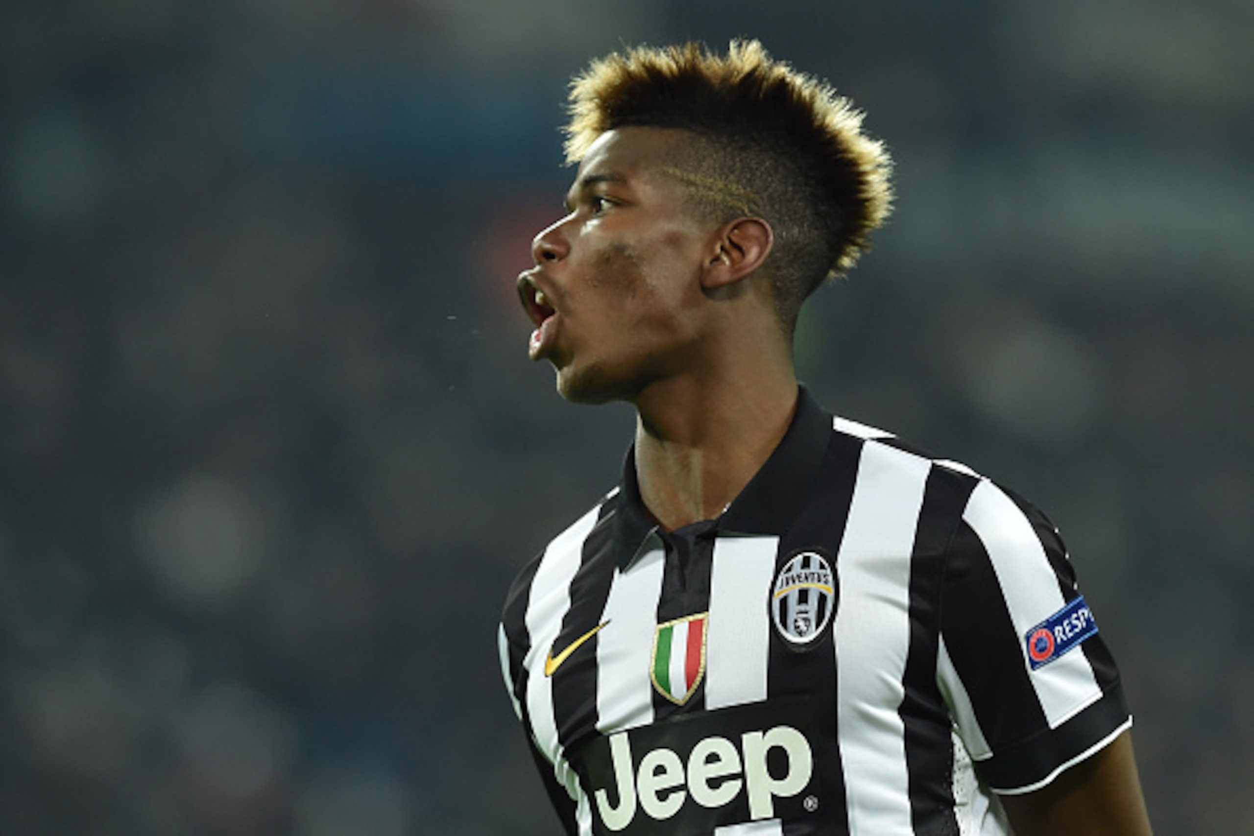 TURIN, ITALY - DECEMBER 09:  Paul Pogba of Juventus reacts during the UEFA Champions League group A match between Juventus and Club Atletico de Madrid at Juventus Arena on December 9, 2014 in Turin, Italy.  (Photo by Valerio Pennicino/Getty Images)