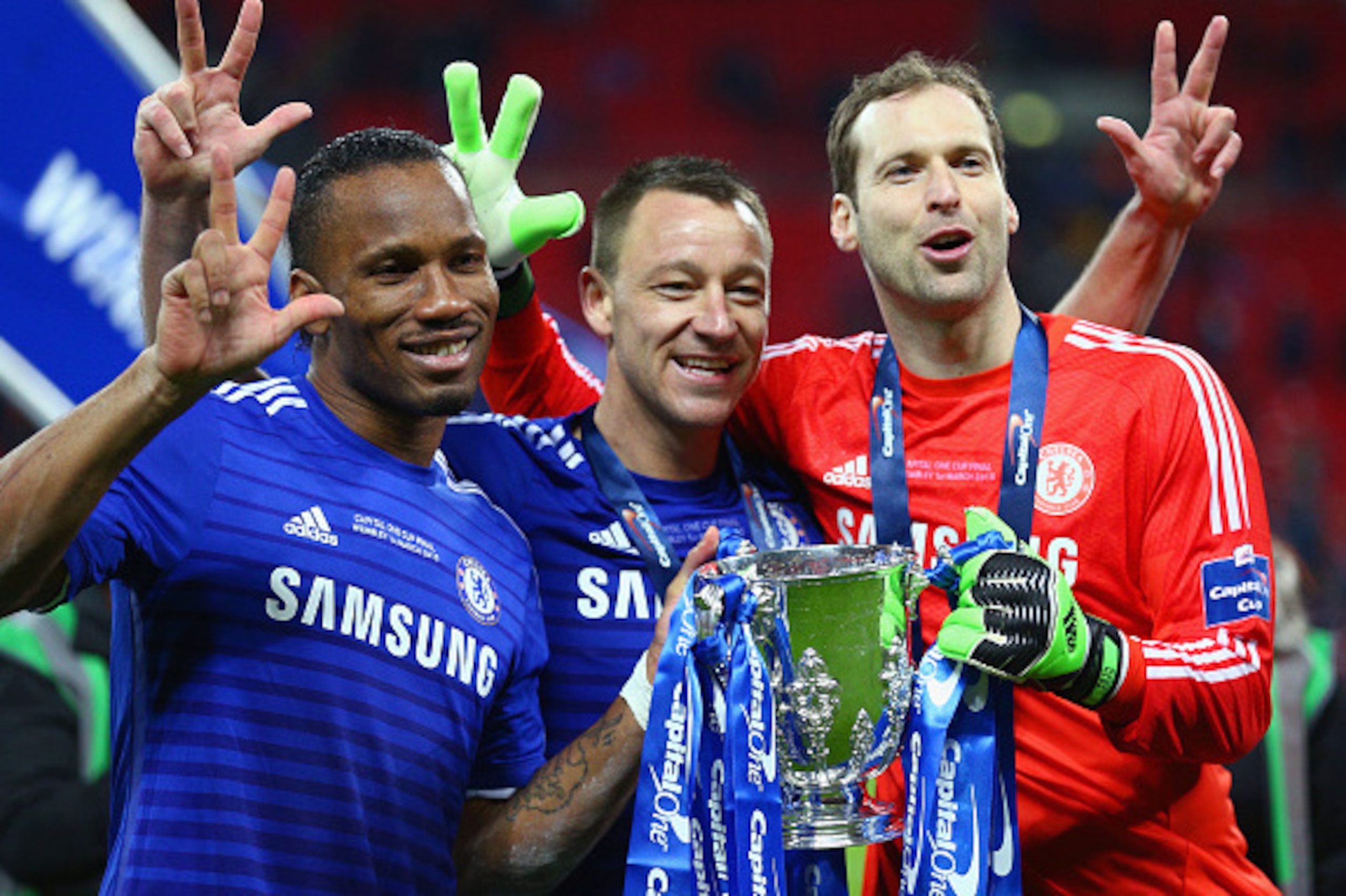 LONDON, ENGLAND - MARCH 01: (L-R) Diego Costa, John Terry and Petr Cech of Chelsea pose with the trophy after the Capital One Cup Final match between Chelsea and Tottenham Hotspur at Wembley Stadium on March 1, 2015 in London, England.  (Photo by Clive Ma