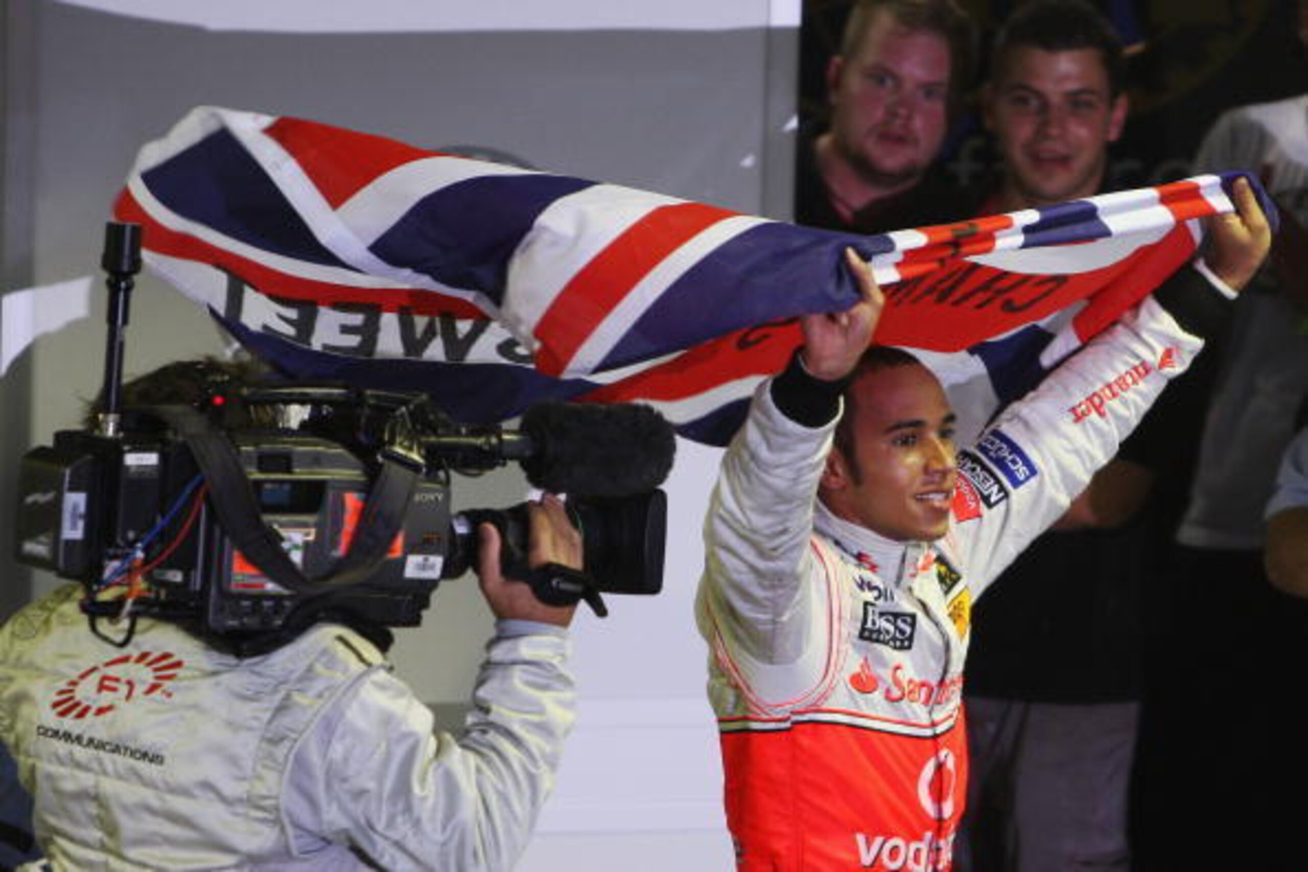 SAO PAULO, BRAZIL - NOVEMBER 02:  New Formula One World Champion Lewis Hamilton of Great Britain and McLaren Mercedes celebrates in parc ferme following the Brazilian Formula One Grand Prix at the Interlagos Circuit on November 2, 2008 in Sao Paulo, Brazi