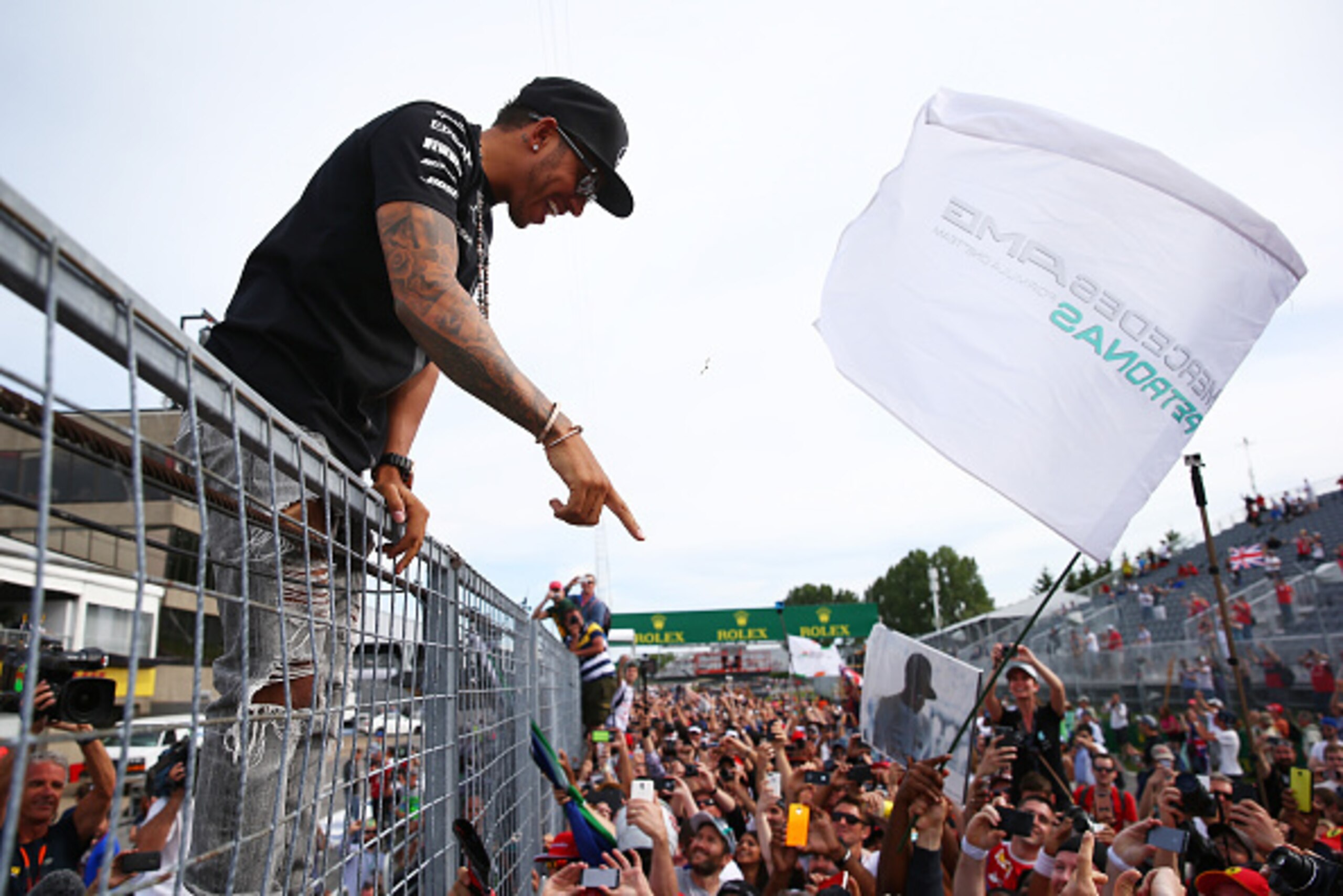 MONTREAL, QC - JUNE 07:  Race winner Lewis Hamilton of Great Britain and Mercedes GP celebrates with the fans during the Canadian Formula One Grand Prix at Circuit Gilles Villeneuve on June 7, 2015 in Montreal, Canada.  (Photo by Mark Thompson/Getty Image