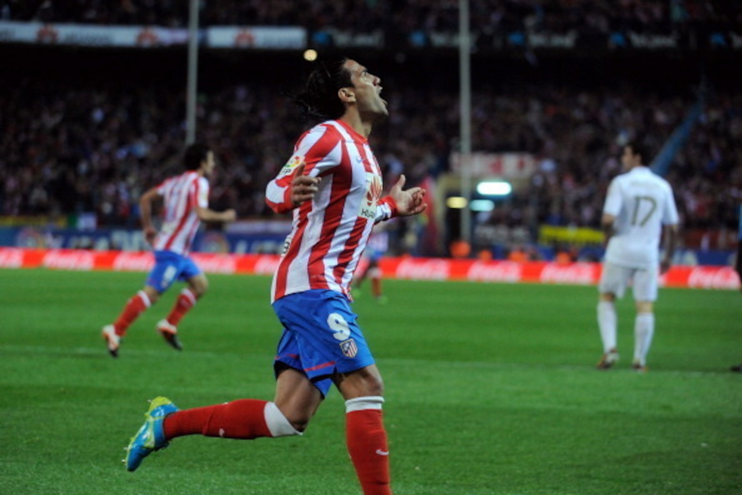MADRID, SPAIN - APRIL 11:  Radamel Falcao of Atletico Madrid celebrates after scoring his side's opening goal during the La Liga match between Club Atletico de Madrid and Real Madrid CF at Vicente Calderon Stadium on April 11, 2012 in Madrid, Spain.  (Pho
