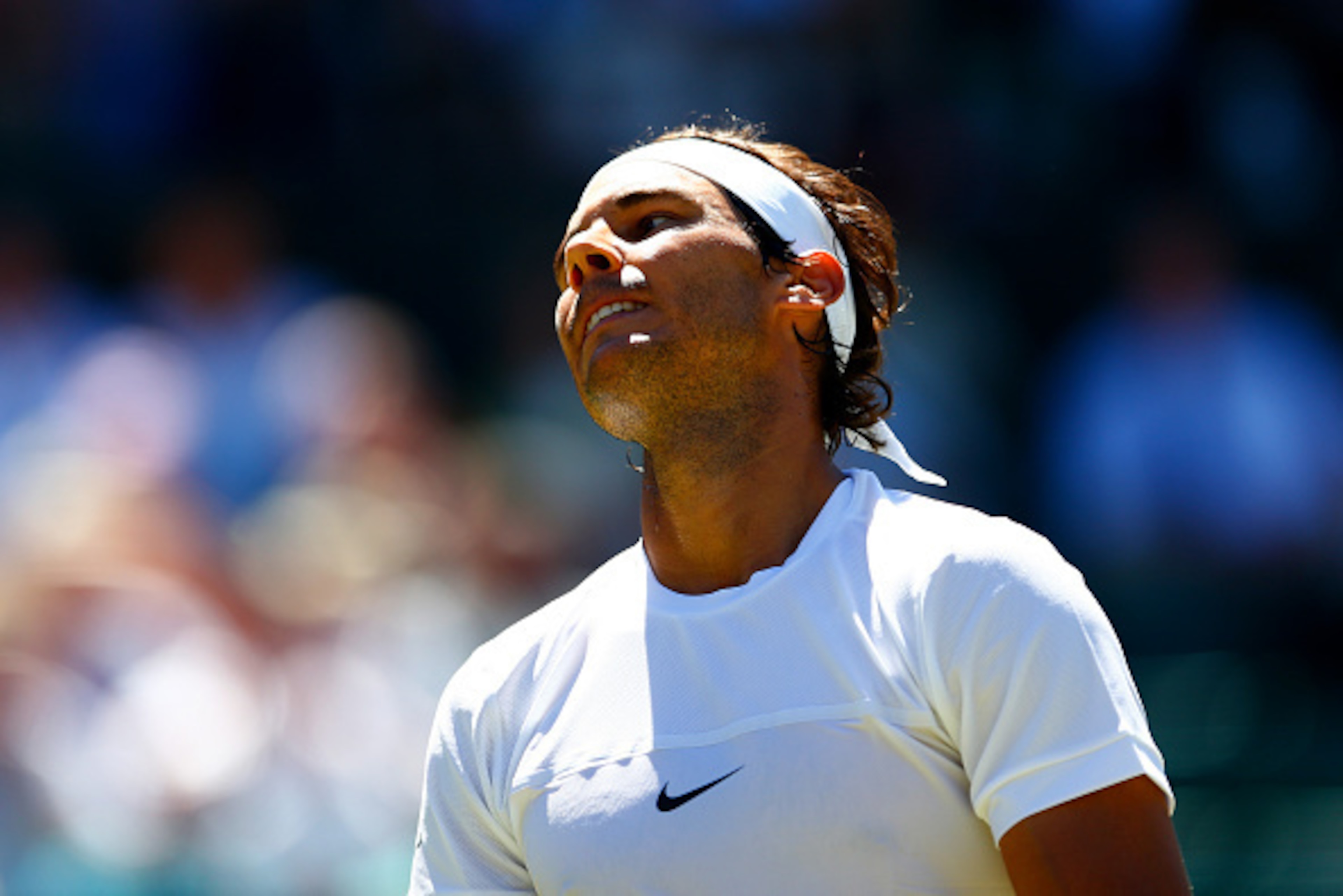 LONDON, ENGLAND - JUNE 30:  Rafael Nadal of Spain reacts in his Gentlemens Singles first round match against Thomaz Bellucci of Brazil during day two of the Wimbledon Lawn Tennis Championships at the All England Lawn Tennis and Croquet Club on June 30, 20