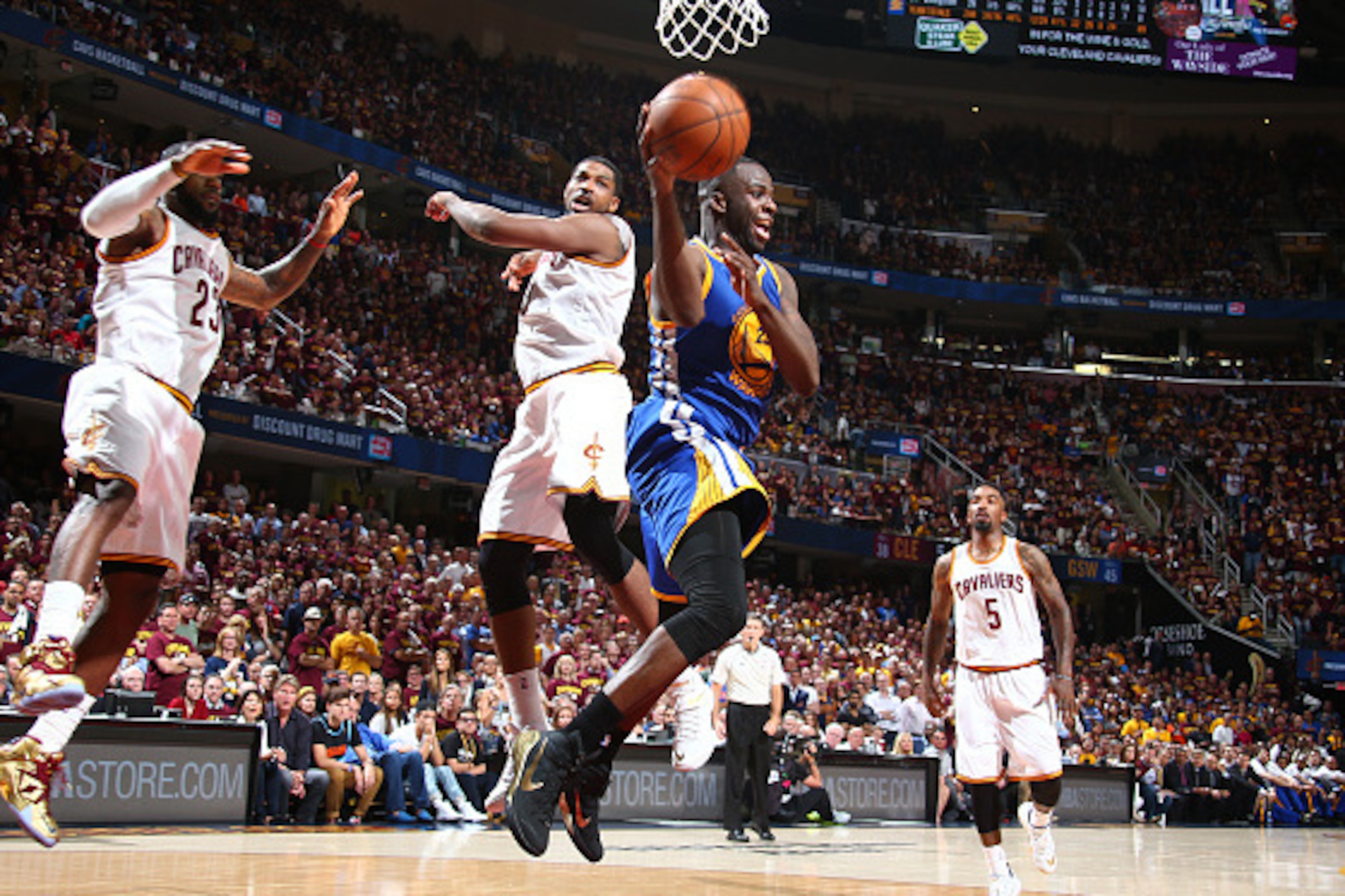 CLEVELAND, OH - JUNE 16:  Draymond Green #23 of the Golden State Warriors looks to pass the ball during Game Six of the 2015 NBA Finals at The Quicken Loans Arena on June 16, 2015 in Cleveland, Ohio. NOTE TO USER: User expressly acknowledges and agrees th
