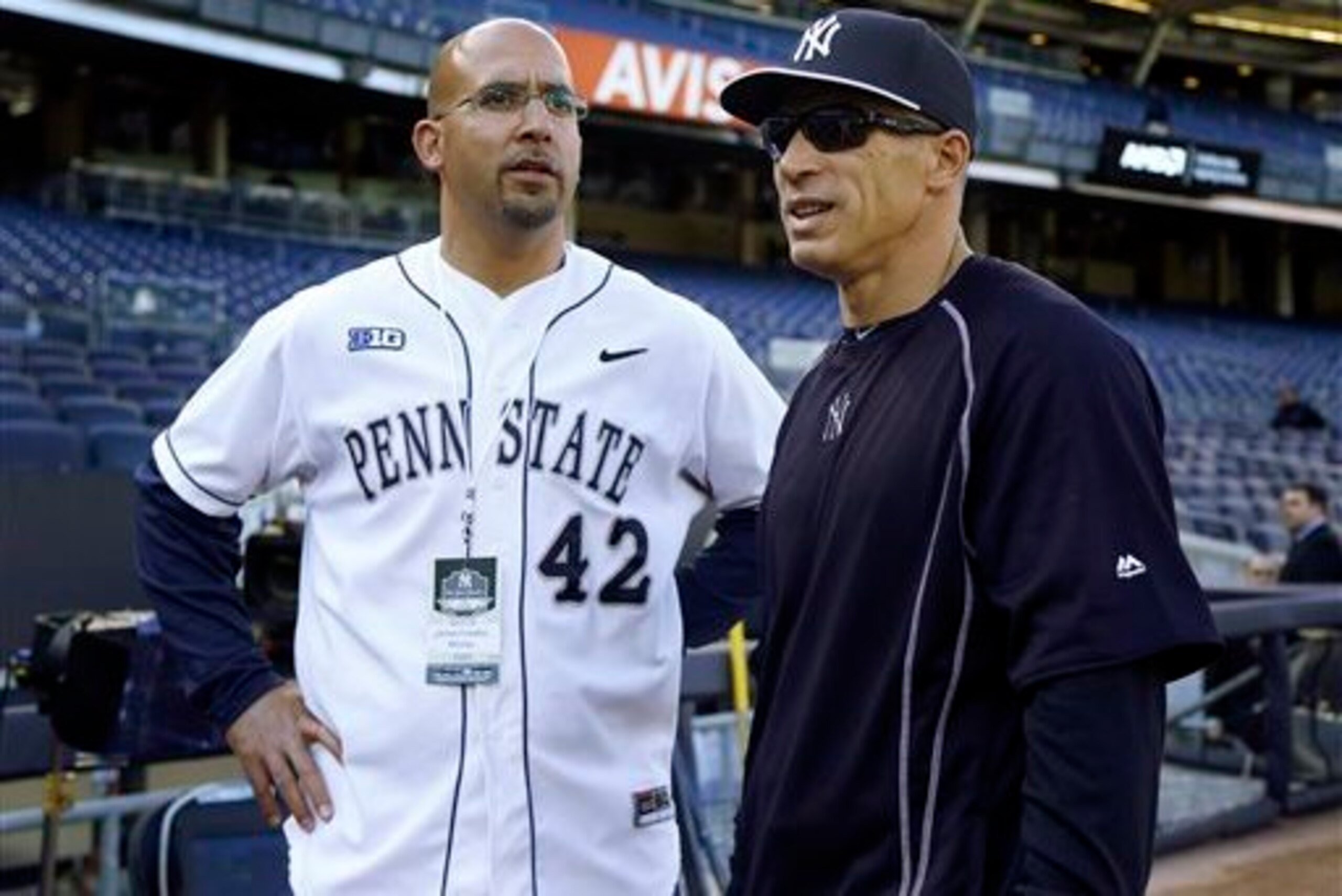 James Franklin (left) chats with Yankees manager Joe Girardi.