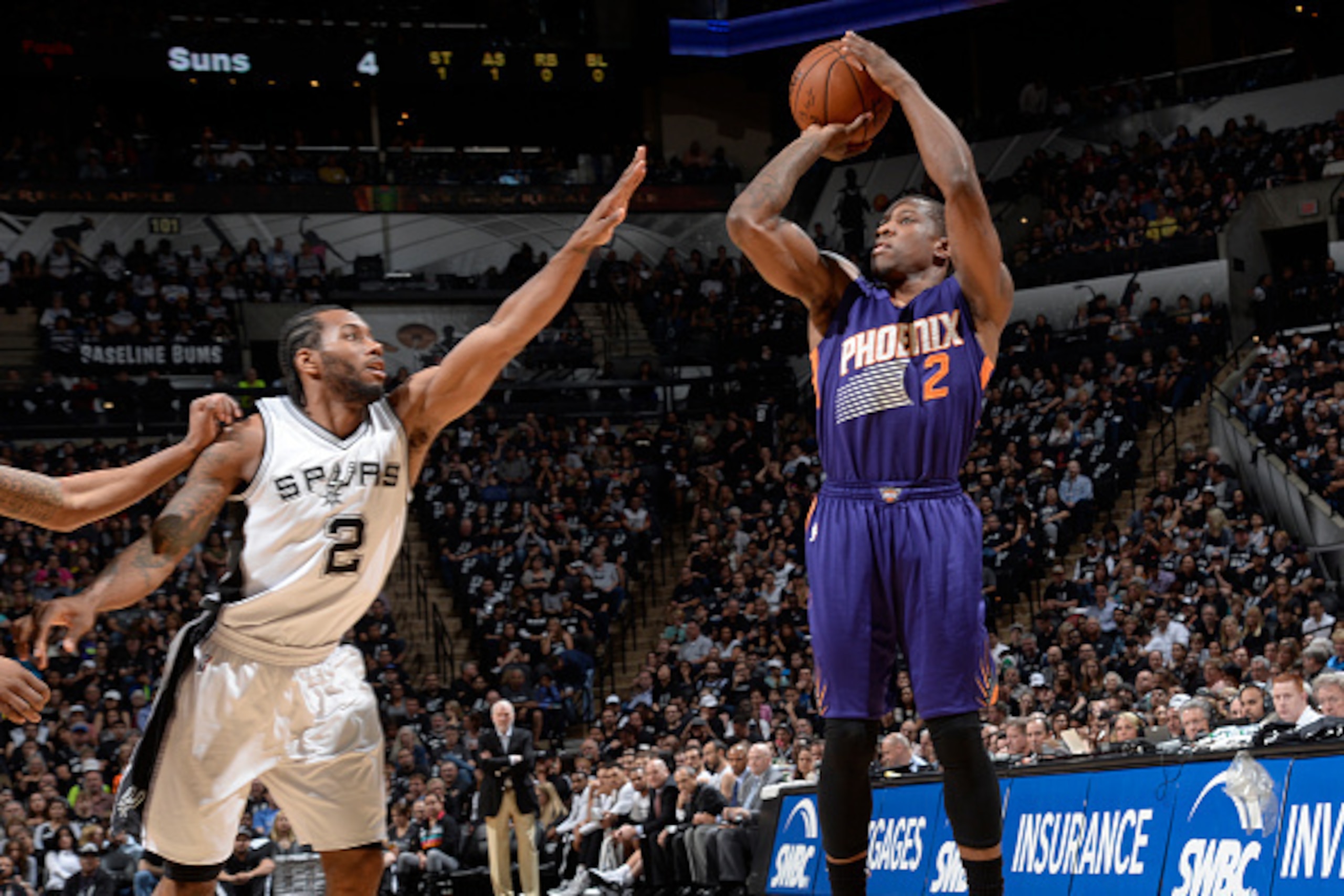 SAN ANTONIO - APRIL 12: Eric Bledsoe #2 of the Phoenix Suns takes a shot against the San Antonio Spurs at the AT&T Center on April 12, 2014 in San Antonio, Texas. NOTE TO USER: User expressly acknowledges and agrees that, by downloading and or using this 