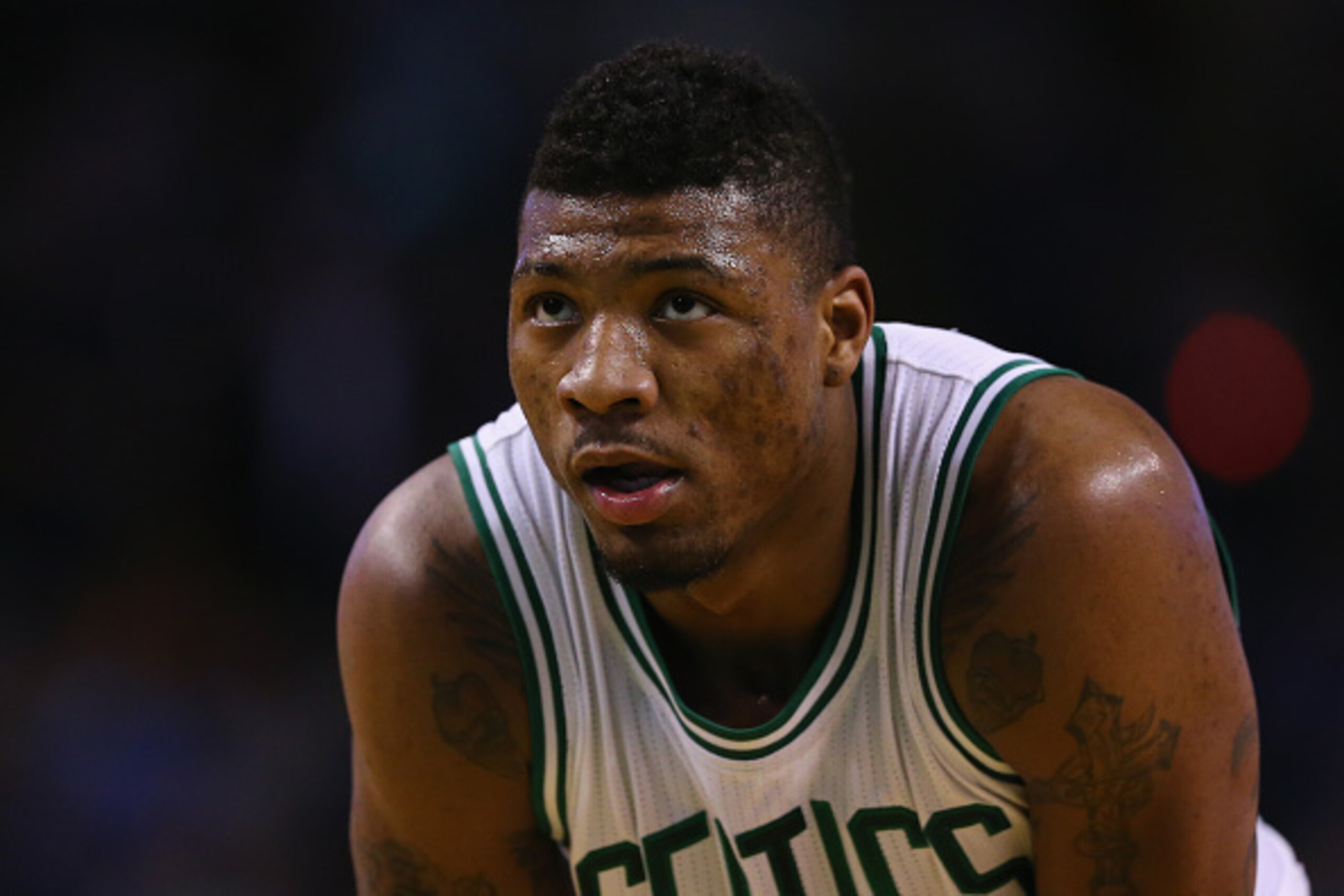BOSTON, MA - MARCH 11:  Marcus Smart #36 of the Boston Celtics looks on during the game against the Memphis Grizzlies at TD Garden on March 11, 2015 in Boston, Massachusetts. NOTE TO USER: User expressly acknowledges and agrees that, by downloading and/or