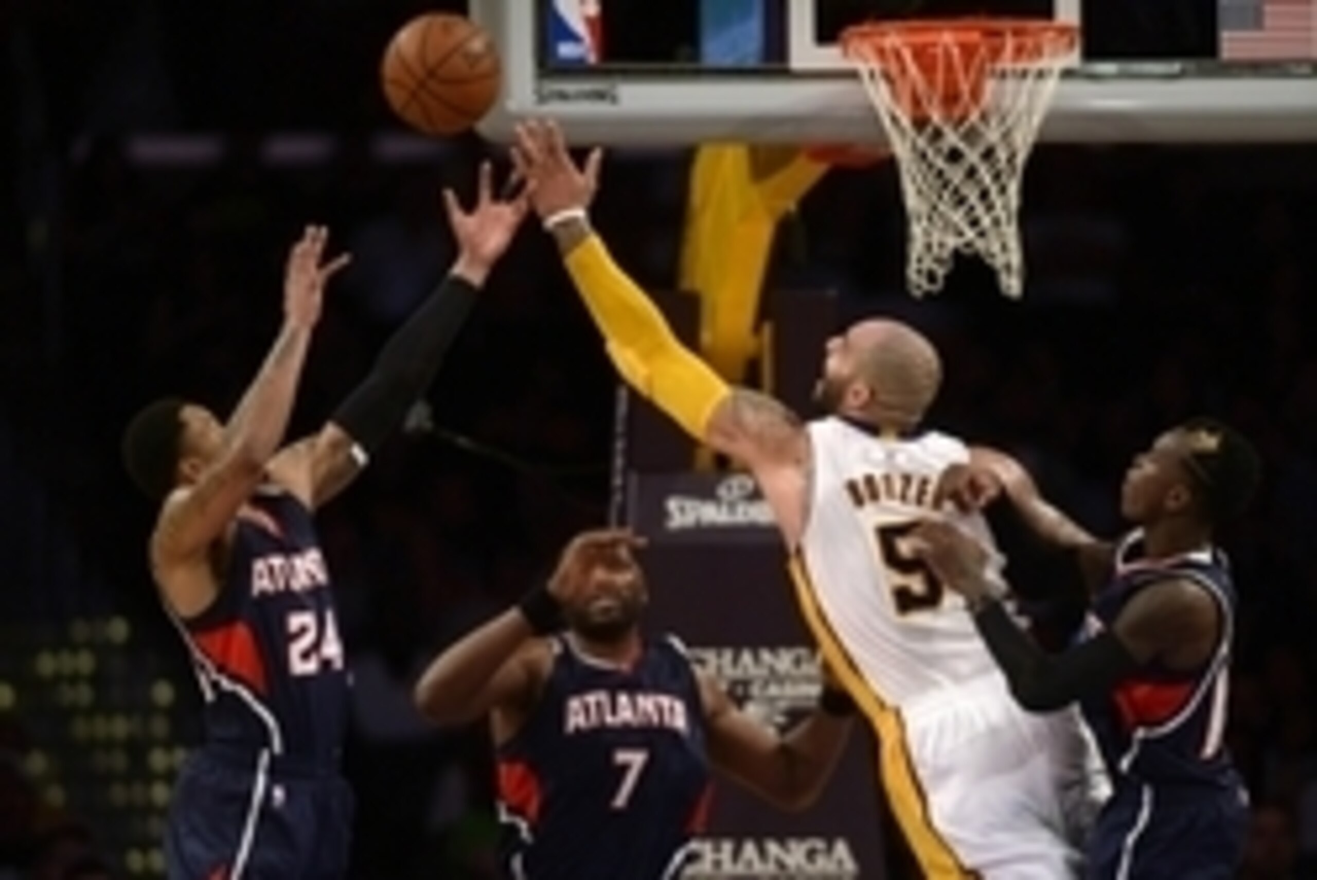 Mar 15, 2015; Los Angeles, CA, USA; Los Angeles Lakers forward Carlos Boozer (5) and Atlanta Hawks guard Kent Bazemore (24) battle for the rebound during the fourth quarter at Staples Center. The Atlanta Hawks won 91-86. Mandatory Credit: Kelvin Kuo-USA T