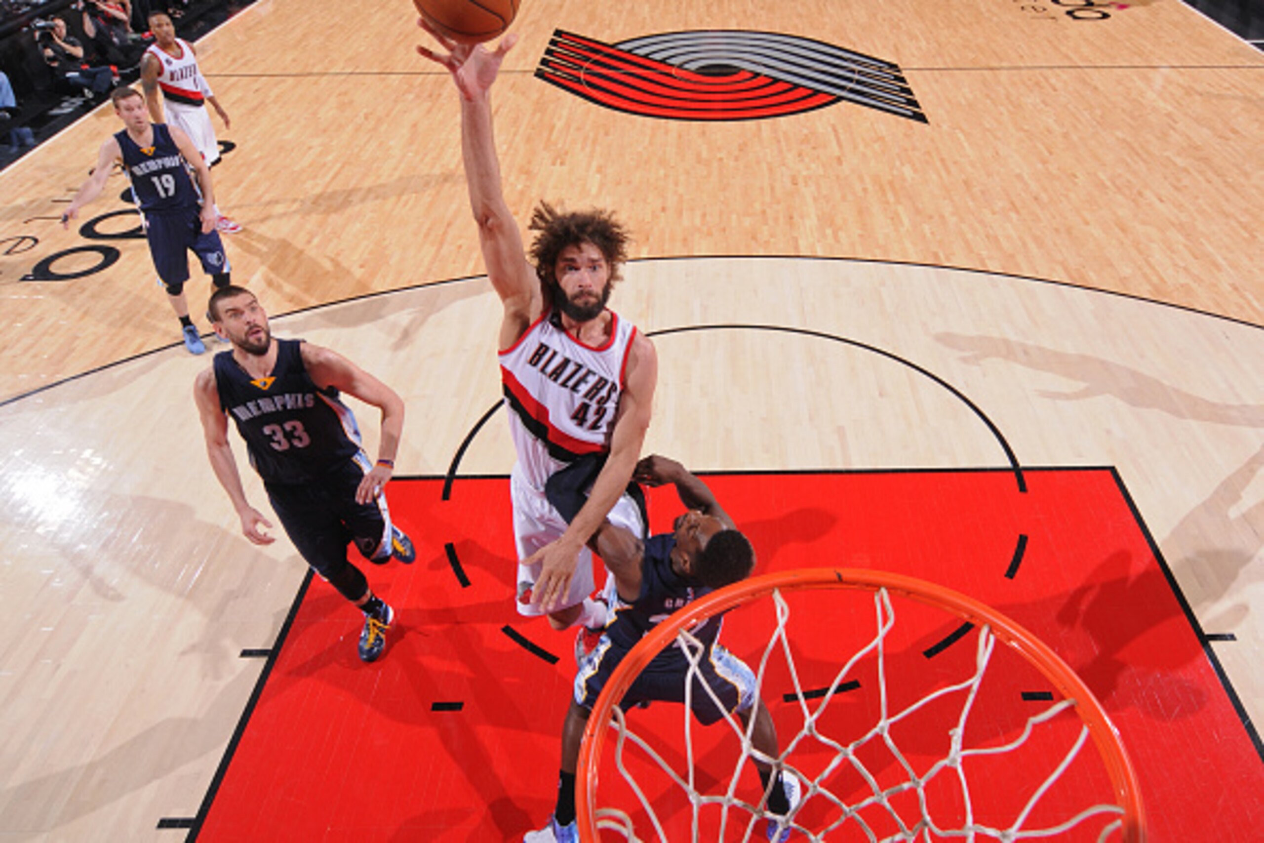 PORTLAND, OR - APRIL 27:  Robin Lopez #42 of the Portland Trail Blazers shoots the ball against the Memphis Grizzlies in Game Four of the Western Conference Quarterfinals during the 2015 NBA Playoffs on April 27, 2015 at the Moda Center in Portland, Orego