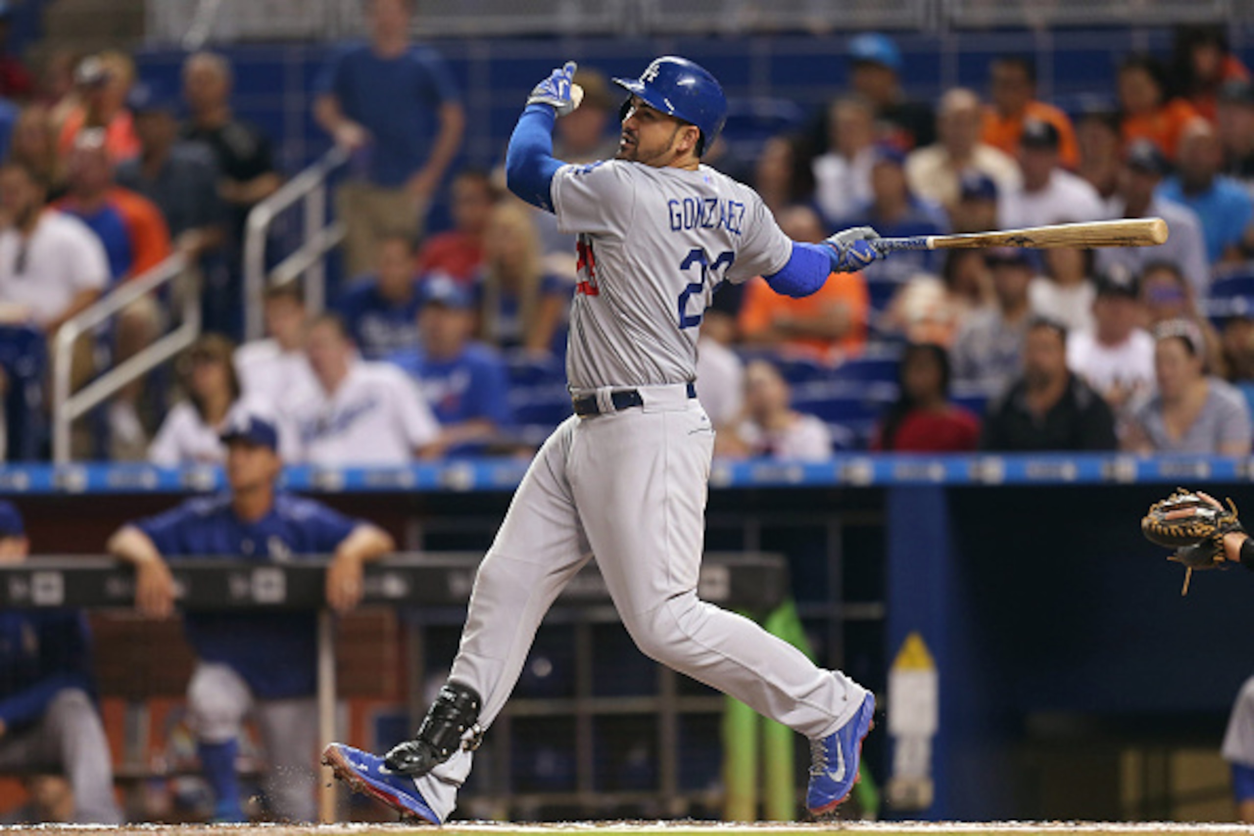 MIAMI, FL - JUNE 27: Adrian Gonzalez #23 of the Los Angeles Dodgers hits an RBI single during the fourth inning of the game against the Miami Marlins at Marlins Park on June 27, 2015 in Miami, Florida.  (Photo by Rob Foldy/Getty Images)