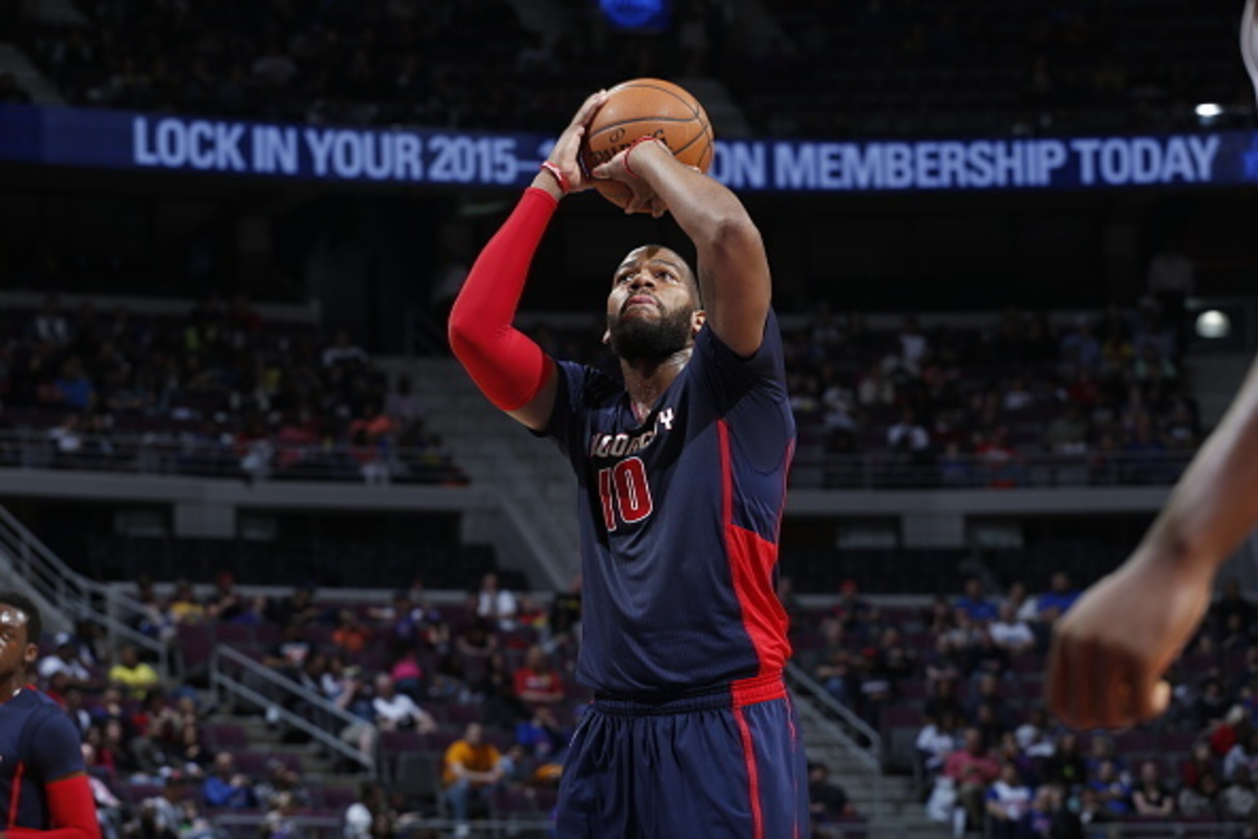DETROIT, MI - APRIL 12: Greg Monroe #10 of the Detroit Pistons shoots against the Charlotte Hornets during the game on April 12, 2015 at The Palace of Auburn in Detroit, Michigan. NOTE TO USER: User expressly acknowledges and agrees that, by downloading a