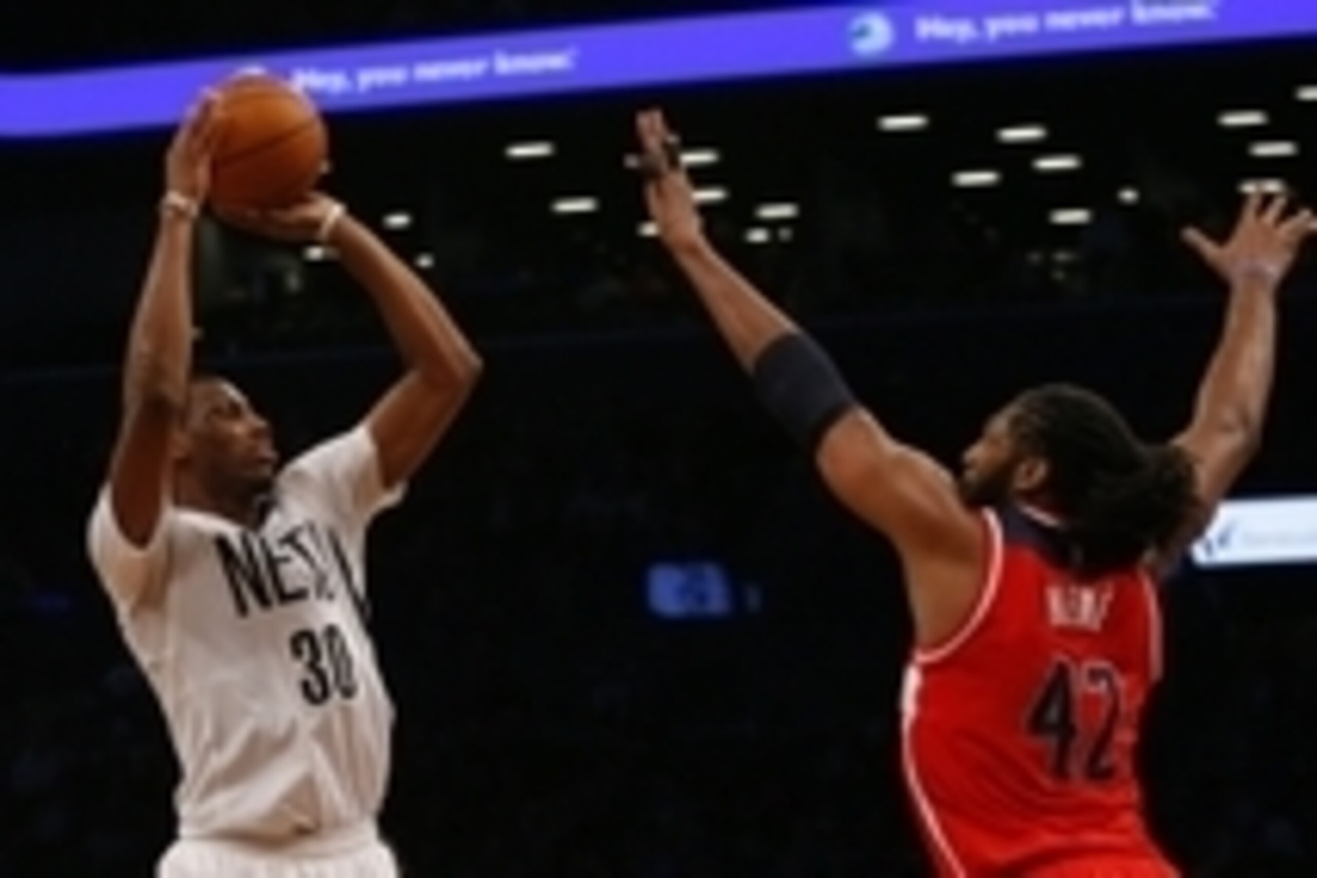 Apr 10, 2015; Brooklyn, NY, USA; Brooklyn Nets forward Thaddeus Young (30) shoots the ball over Washington Wizards forward Nene Hilario (42) during second half at Barclays Center. Mandatory Credit: Noah K. Murray-USA TODAY Sports Apr 10, 2015; Brooklyn, NY, USA; Brooklyn Nets forward Thaddeus Young (30) shoots the ball over Washington Wizards forward Nene Hilario (42) during second half at Barclays Center. Mandatory Credit: Noah K. Murray-USA TODAY Sports
