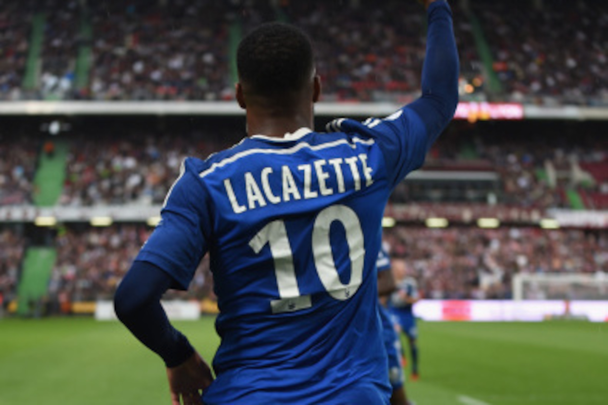 METZ, FRANCE - AUGUST 31: Alexandre Lacazette of Lyon celebrates scoring his team's first goal during the French Ligue 1 match between FC Metz and Olympique Lyonnais at Stade Saint-Symphorien on August 31, 2014 in Metz, France. (Photo by Kaz Photography METZ, FRANCE - AUGUST 31: Alexandre Lacazette of Lyon celebrates scoring his team's first goal during the French Ligue 1 match between FC Metz and Olympique Lyonnais at Stade Saint-Symphorien on August 31, 2014 in Metz, France. (Photo by Kaz Photography