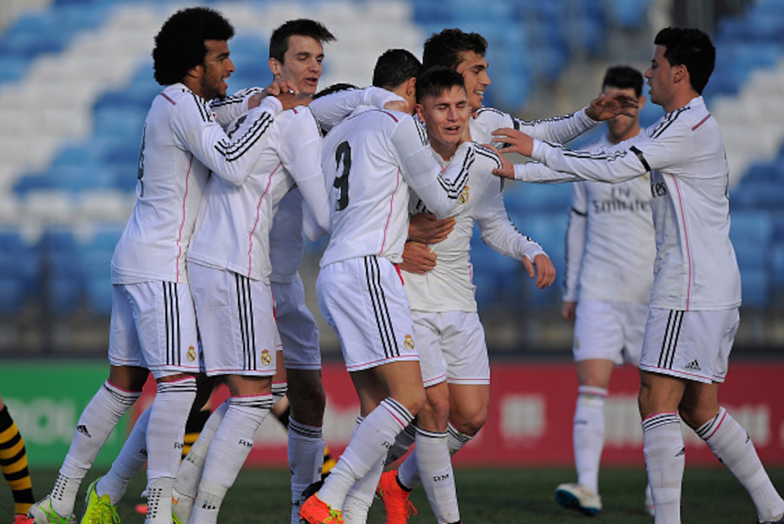 MADRID, SPAIN - FEBRUARY 21:  Guillermo Varela of Real Madrid Castilla celebrates with team mates after scoring his team's 3rd goal during the Segunda Division B match between Real Madrid Castilla v Barakaldo CF at estadio Alfredo Di Stefano on February 2
