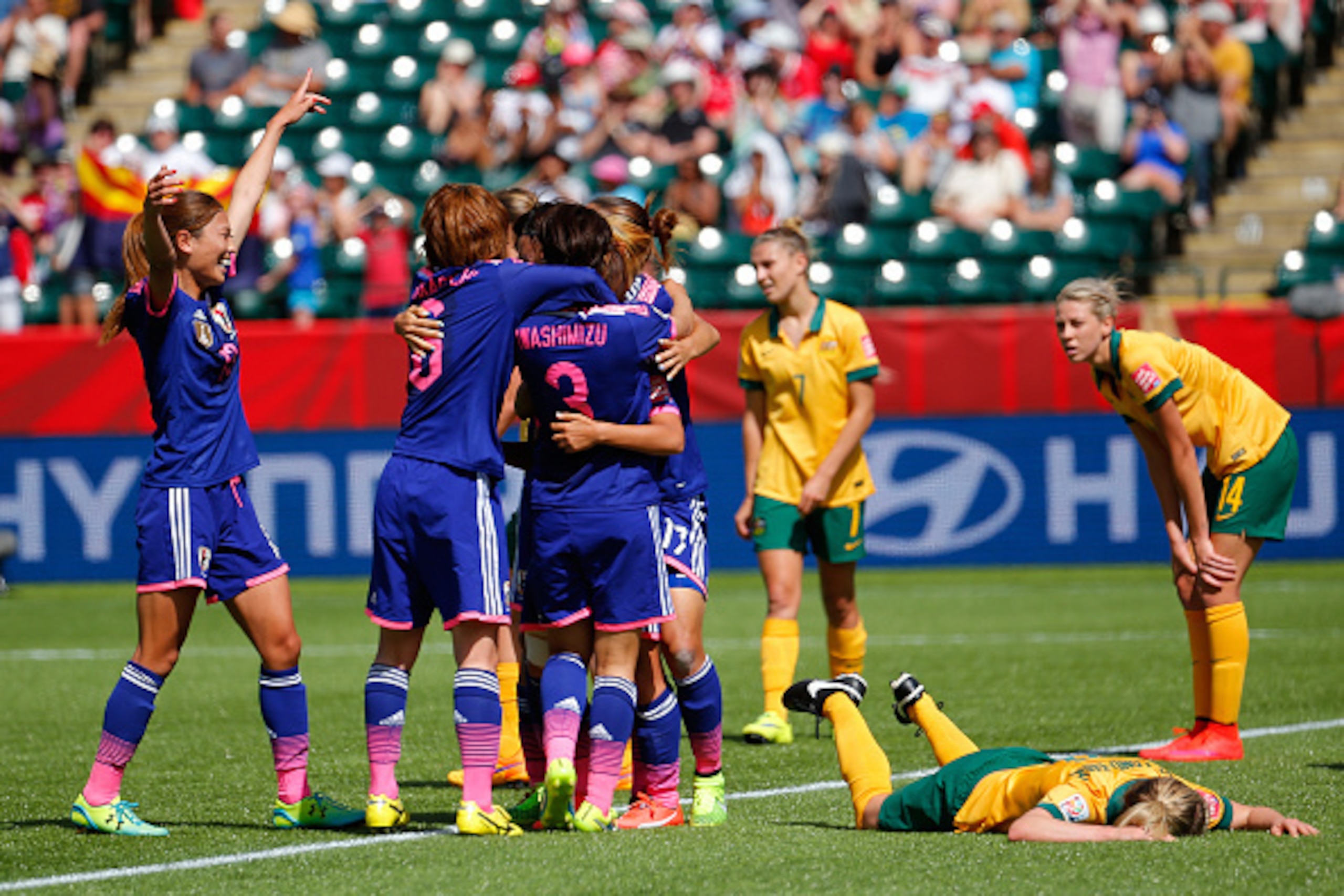 EDMONTON, AB - JUNE 27:  Mana Iwabuchi #16 of Japan celebrates scoring a goal against Australia during the FIFA Women's World Cup Canada 2015 Quarter Final match between Australia and Japan at Commonwealth Stadium on June 27, 2015 in Edmonton, Canada.  (P