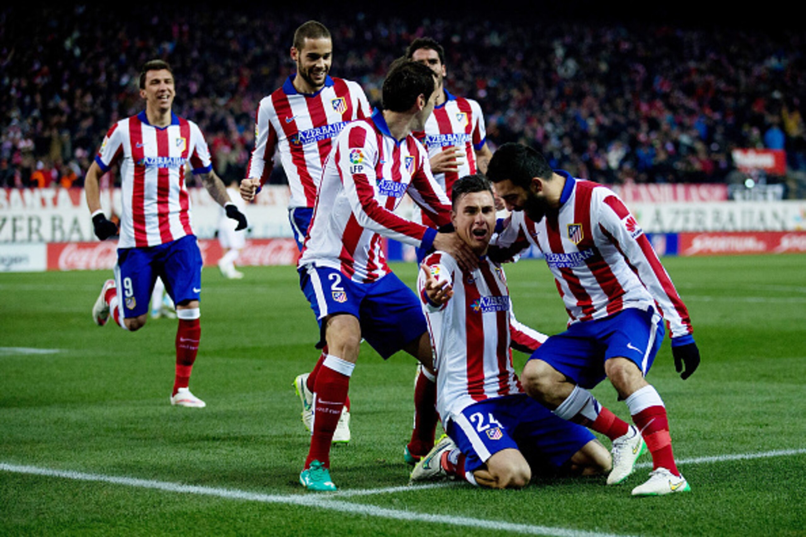 MADRID, SPAIN - JANUARY 07:  Jose Maria Gimenez of Atletico de Madrid celebrates scoring their second goal with teammates during the Copa del Rey Round of 16  first leg match between Club Atletico de Madrid and Real Madrid CF at Vicente Calderon Stadium o