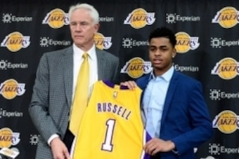 Jun 29, 2015; Los Angeles, CA, USA; Los Angeles Lakers guard D'Angelo Russell (1) is introduced to the media by general manager Mitch Kupchak during a press conference at the Toyota Sports Center. Mandatory Credit: Jayne Kamin-Oncea-USA TODAY Sports