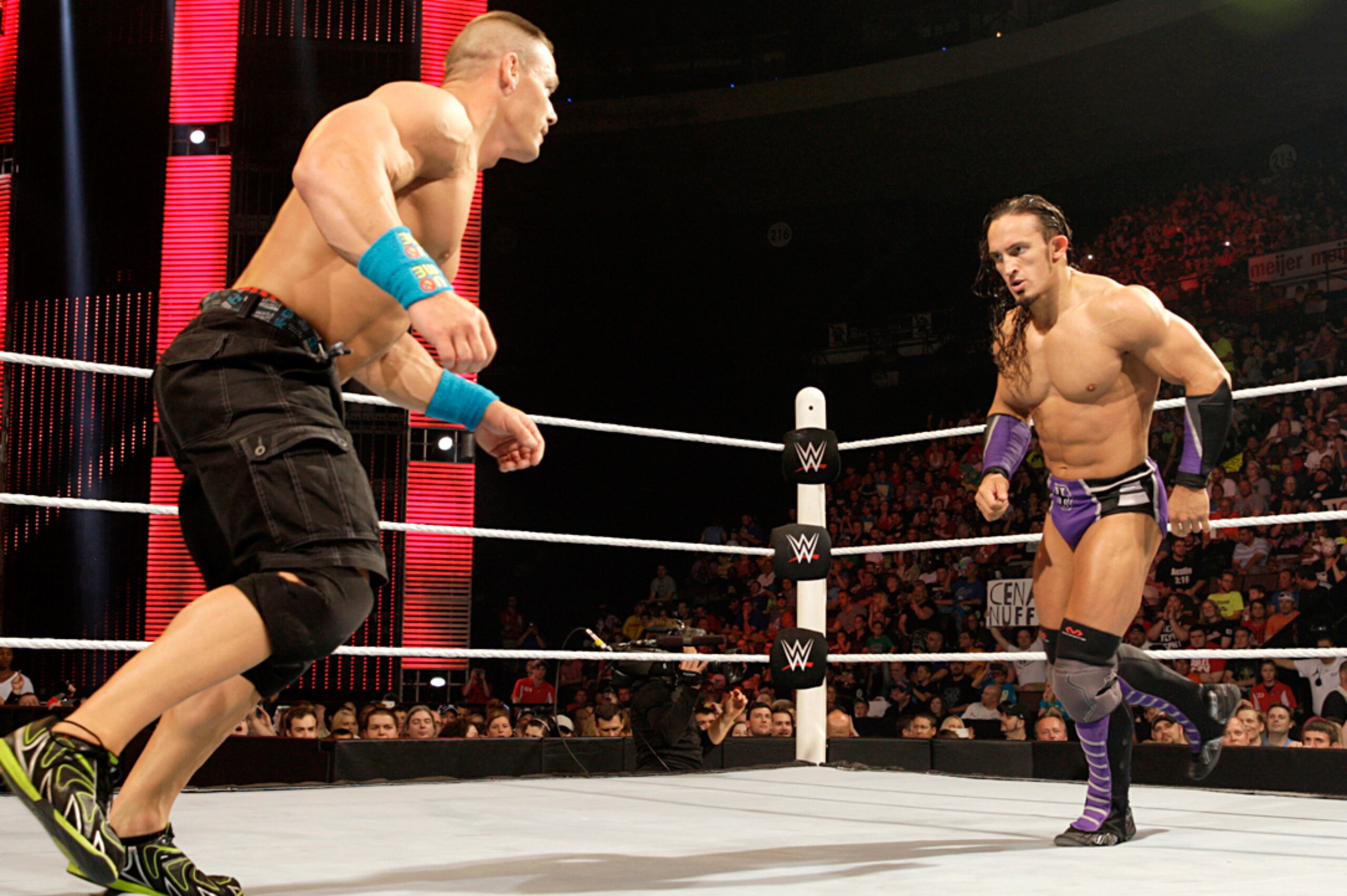John Cena and Neville square off.
