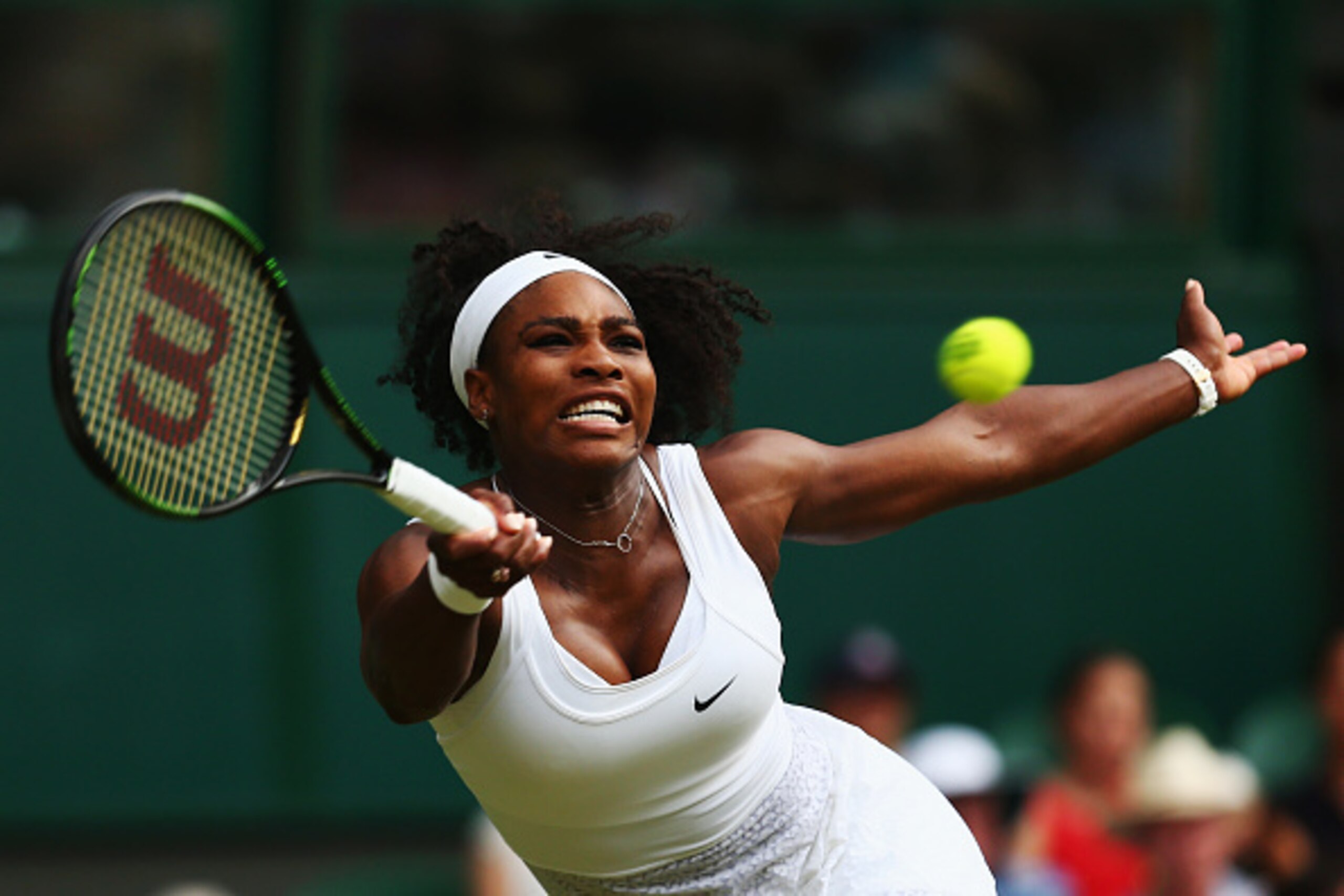 LONDON, ENGLAND - JULY 01:  Serena Williams of the United Statesstretches for a forehand in her Ladies Singles Second Round match against Timea Babos of Hungary during day three of the Wimbledon Lawn Tennis Championships at the All England Lawn Tennis and