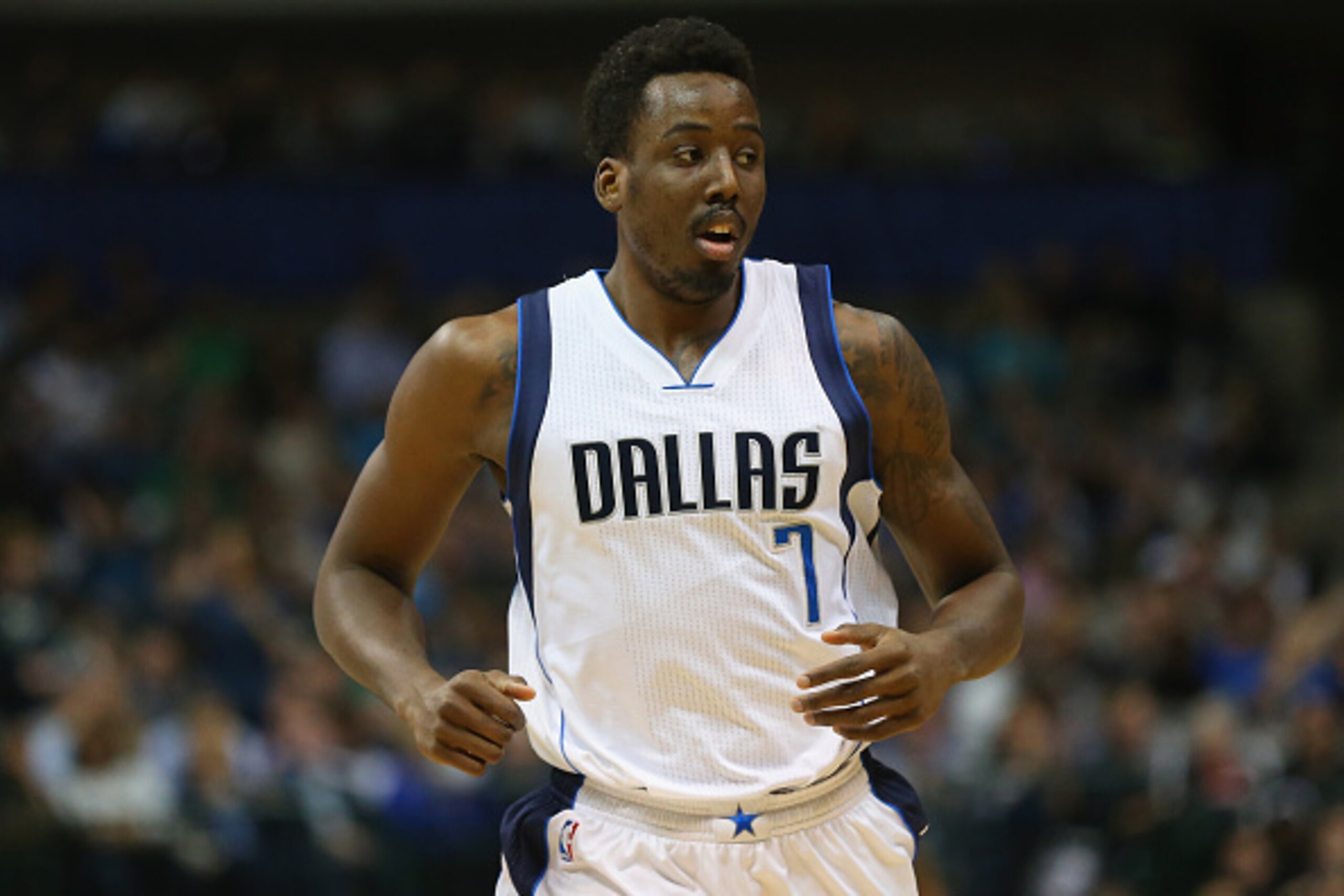 DALLAS, TX - FEBRUARY 11:  Al-Farouq Aminu #7 of the Dallas Mavericks at American Airlines Center on February 11, 2015 in Dallas, Texas.  NOTE TO USER: User expressly acknowledges and agrees that, by downloading and or using this photograph, User is conse