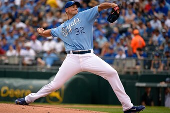 KANSAS CITY, MO - JUNE 21:  Chris Young #32 of the Kansas City Royals throws in the first inning against the Boston Red Sox at Kauffman Stadium on June 21, 2015 in Kansas City, Missouri. (Photo by Ed Zurga/Getty Images)
