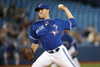 TORONTO, CANADA - JUNE 27: Matt Boyd #46 of the Toronto Blue Jays delivers a pitch in the first inning during MLB game action against the Texas Rangers on June 27, 2015 at Rogers Centre in Toronto, Ontario, Canada. (Photo by Tom Szczerbowski/Getty Images)
