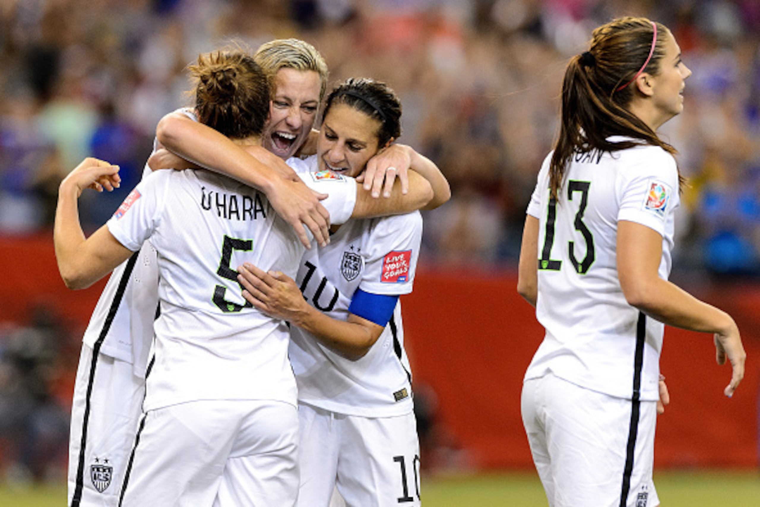 MONTREAL, QC - JUNE 30:  Kelley O'Hara #5 of the United States celebrates with teammates after scoring a goal in the second half against Germany in the FIFA Women's World Cup 2015 Semi-Final Match at Olympic Stadium on June 30, 2015 in Montreal, Canada.  