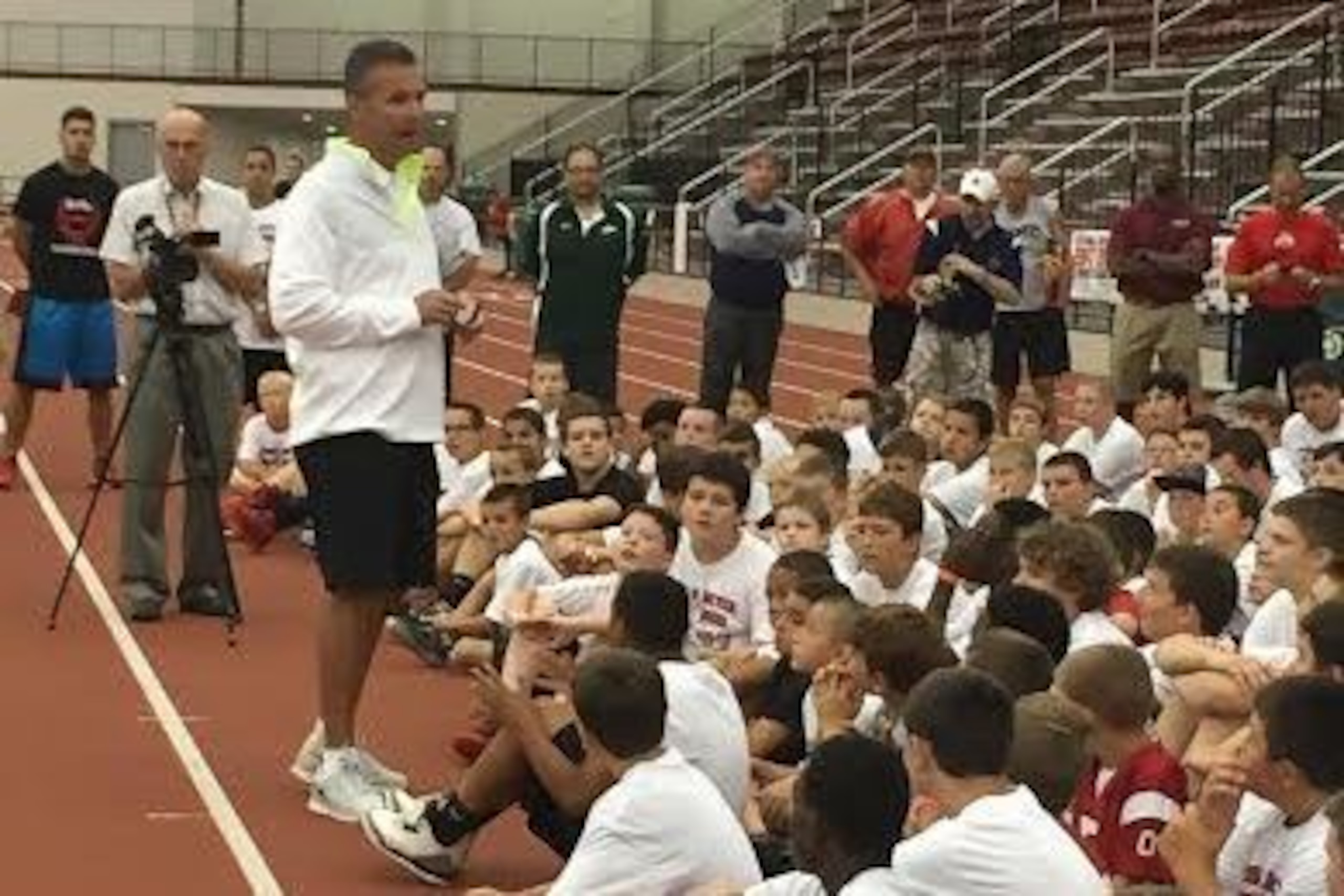 Urban Meyer speaks to campers at his annual youth camp.
