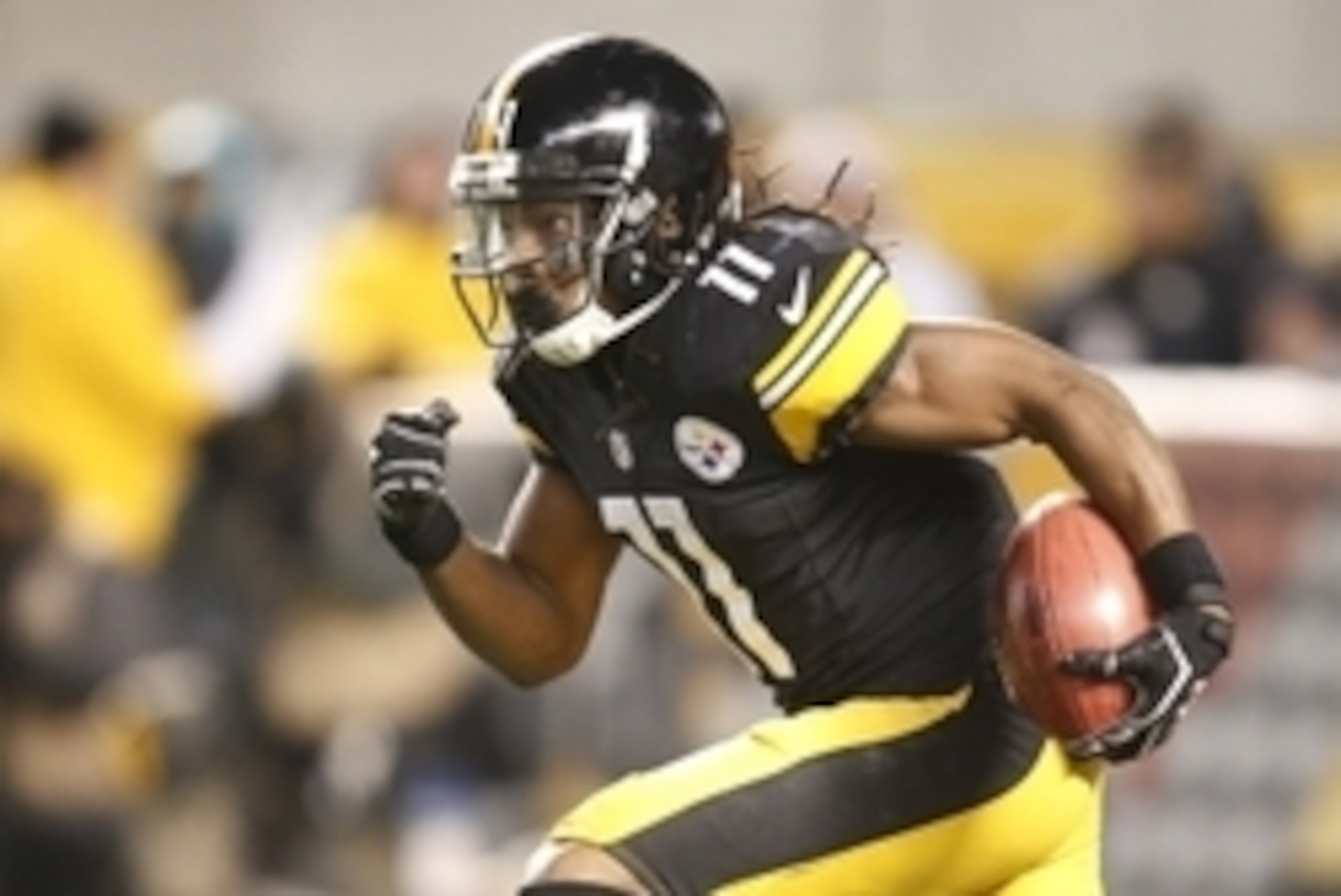 Dec 28, 2014; Pittsburgh, PA, USA; Pittsburgh Steelers wide receiver Markus Wheaton (11) returns a kickoff against the Cincinnati Bengals during the fourth quarter at Heinz Field. The Steelers won 27-17. Mandatory Credit: Charles LeClaire-USA TODAY Sports