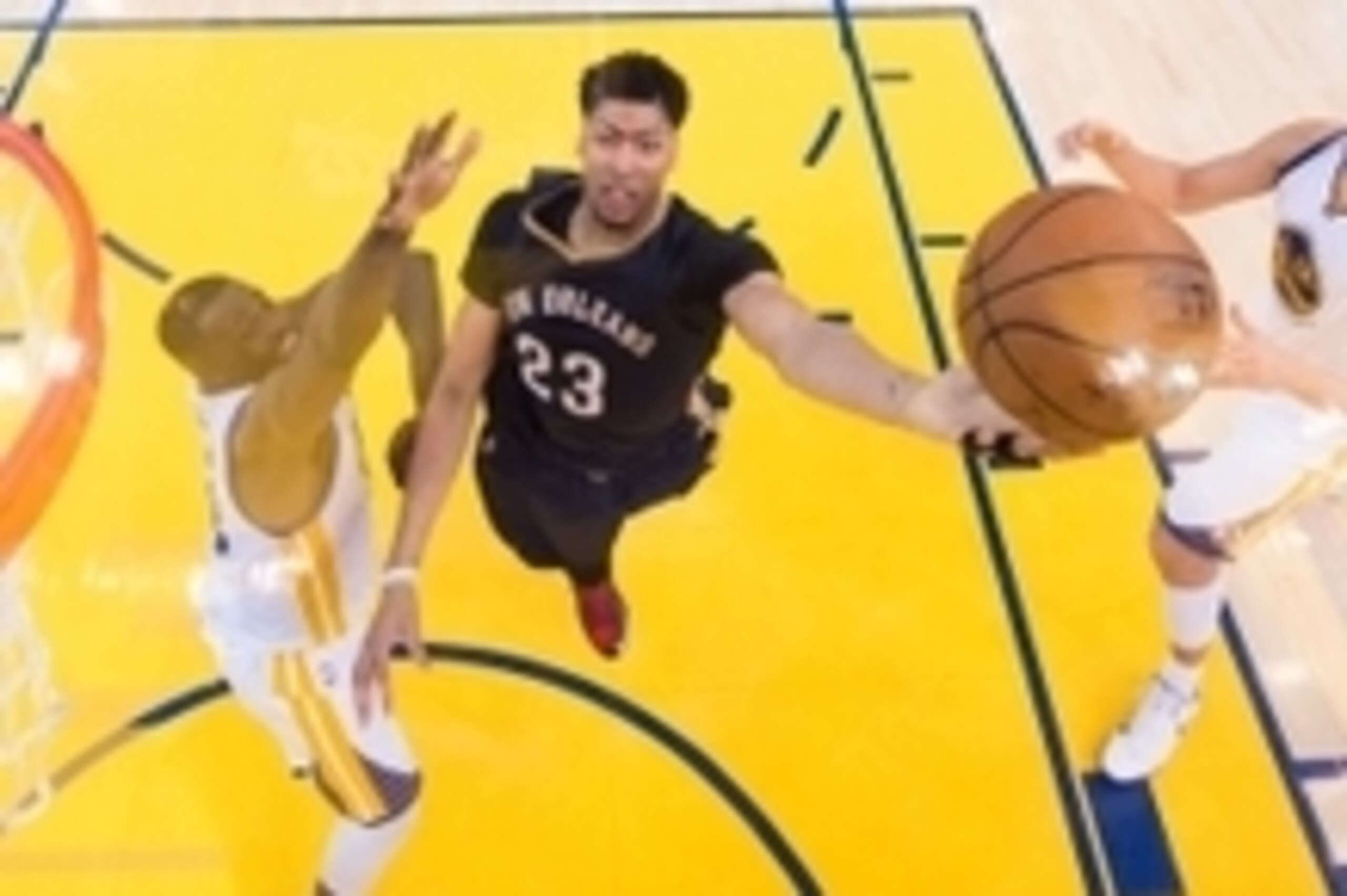 April 20, 2015; Oakland, CA, USA; New Orleans Pelicans forward Anthony Davis (23, center) shoots a layup against Golden State Warriors forward Draymond Green (23, left) and center Andrew Bogut (12) during the second half in game two of the first round of 
