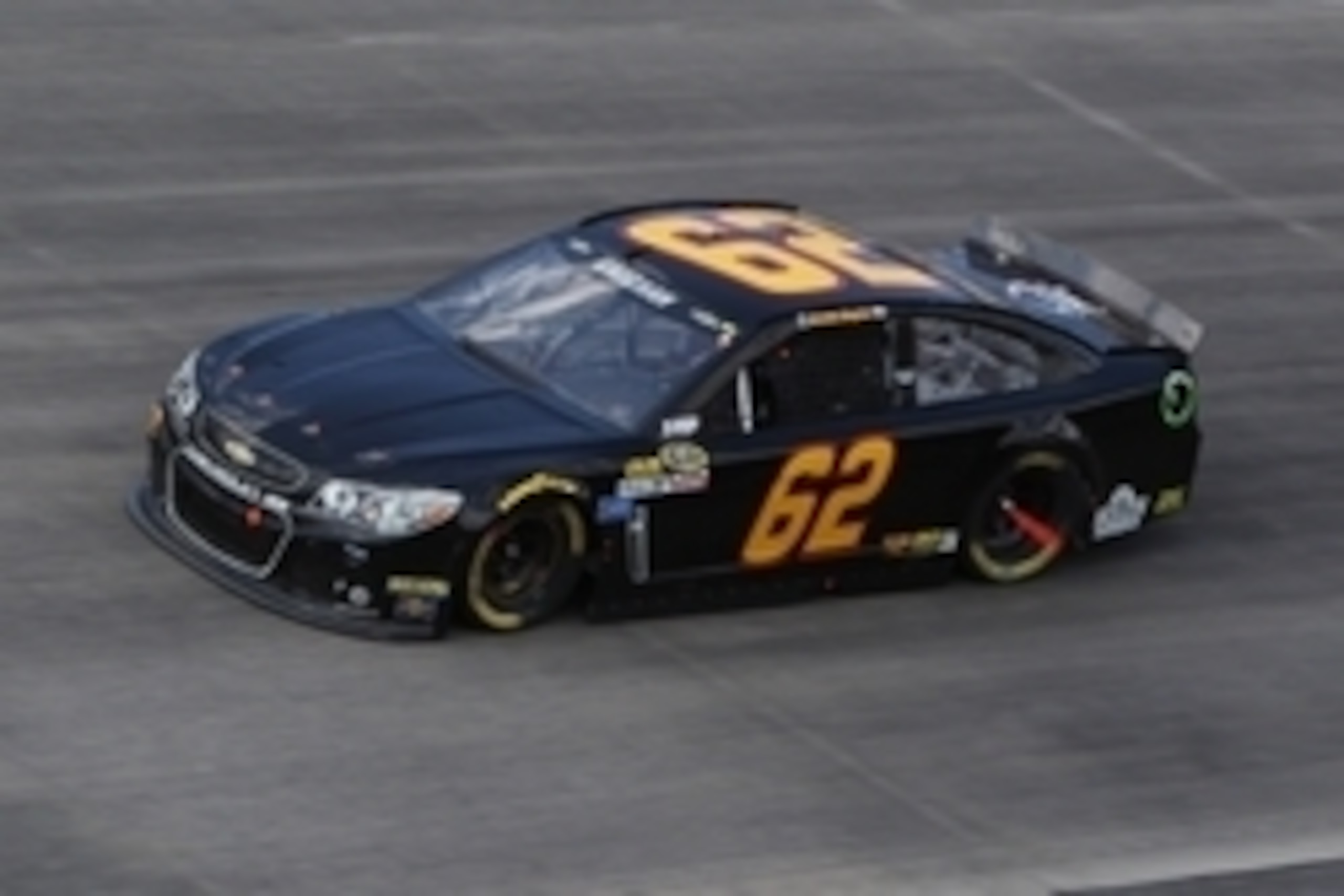 May 31, 2015; Dover, DE, USA; NASCAR Sprint Cup Series driver Brendan Gaughan (62) races during the FedEx 400 benefiting Autism Speaks at Dover International Speedway. Mandatory Credit: Matthew O'Haren-USA TODAY Sports