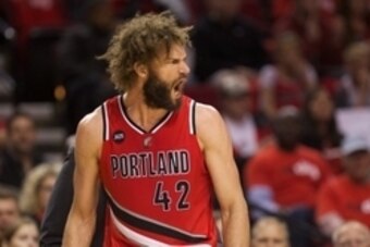 Apr 25, 2015; Portland, OR, USA; Portland Trail Blazers center Robin Lopez (42) reacts after being called for a foul against the Memphis Grizzlies in game three of the first round of the NBA Playoffs at Moda Center at the Rose Quarter. Mandatory Credit: J