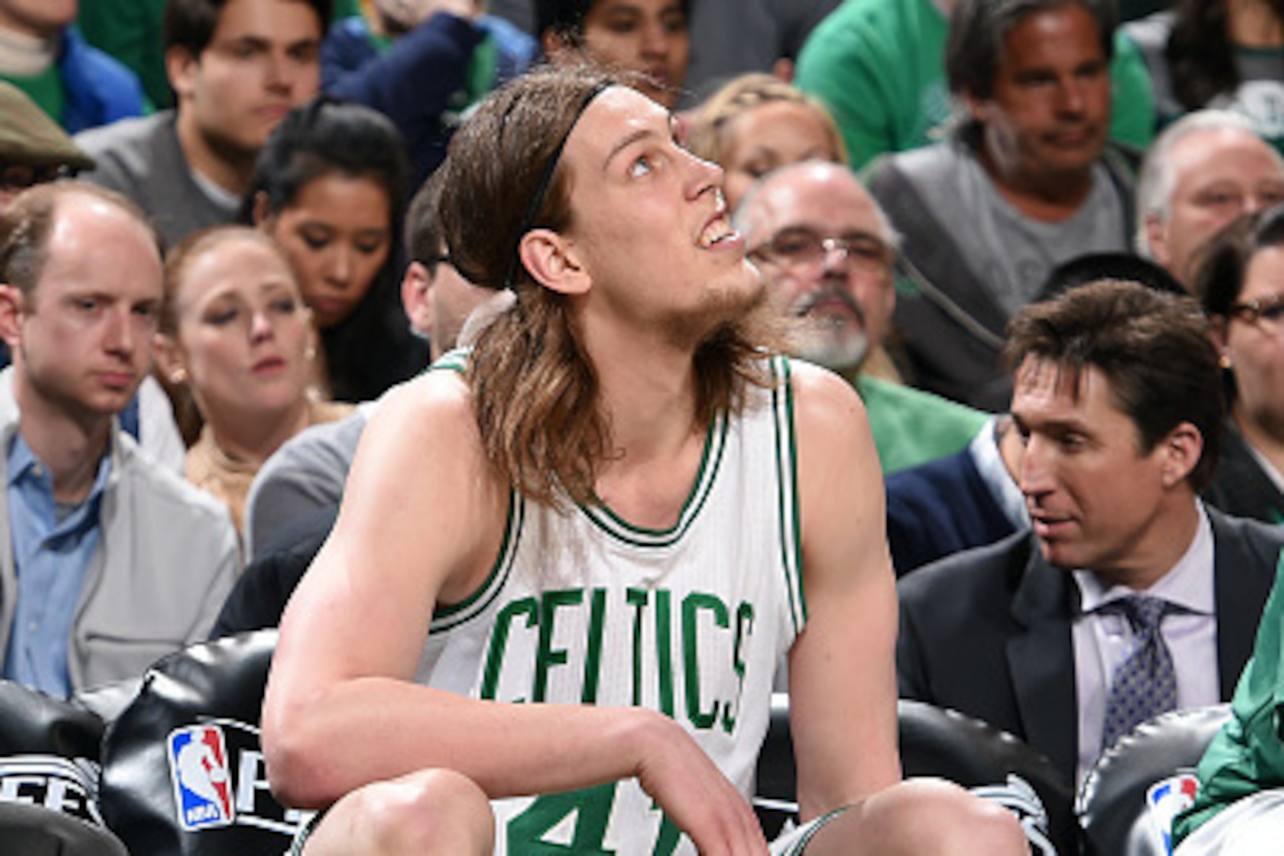 BOSTON, MA - APRIL 26: Kelly Olynyk #41 of the Boston Celtics sits on the sideline during a game against the Cleveland Cavaliers in Game Four of the Eastern Conference Quarterfinals during the 2015 NBA Playoffs on April 26, 2015 at TD Garden in Boston, Ma BOSTON, MA - APRIL 26: Kelly Olynyk #41 of the Boston Celtics sits on the sideline during a game against the Cleveland Cavaliers in Game Four of the Eastern Conference Quarterfinals during the 2015 NBA Playoffs on April 26, 2015 at TD Garden in Boston, Ma