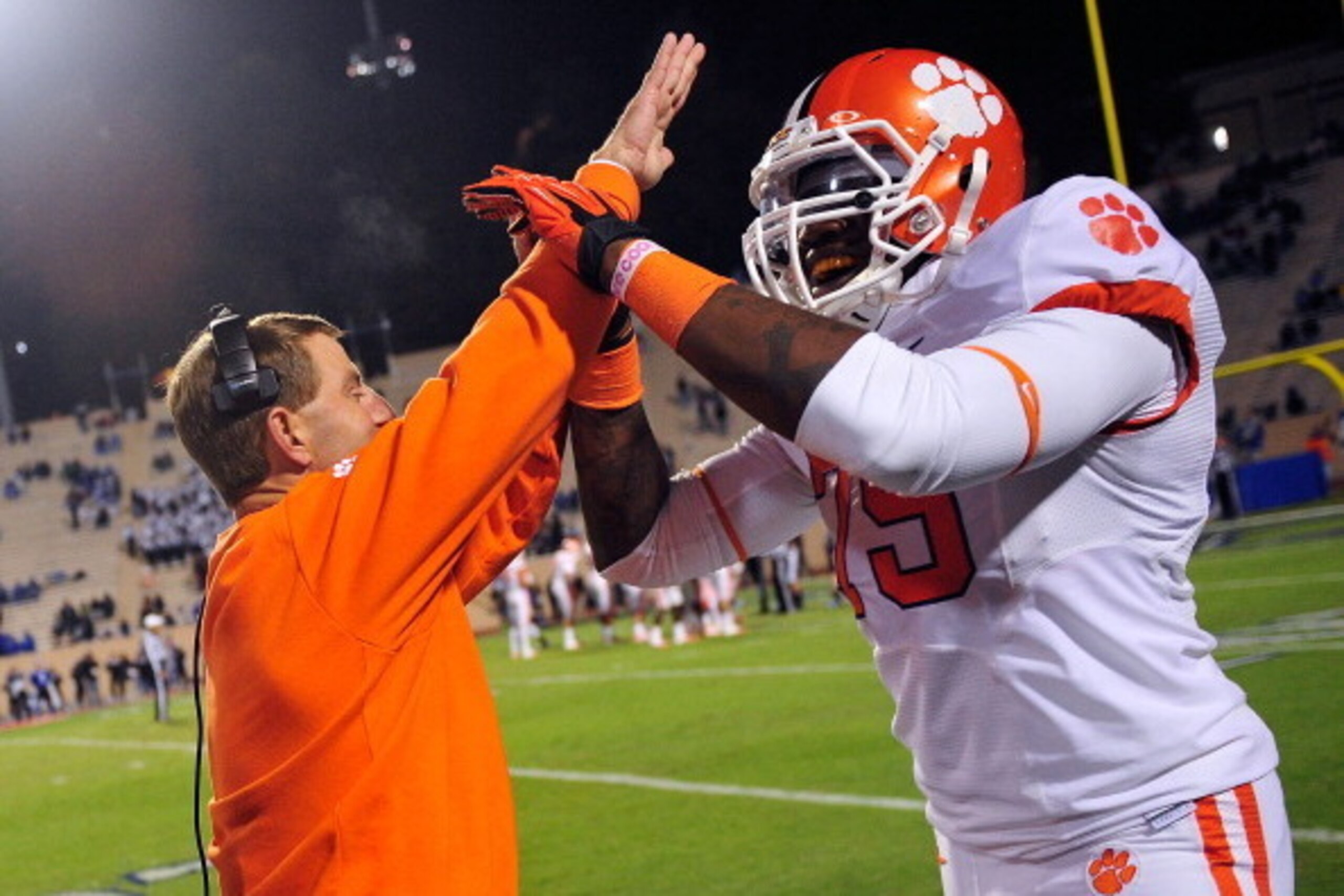 DURHAM, NC - NOVEMBER 03:  Coach Dabo Swinney and Isaiah Battle #79 of the Clemson Tigers celebrate after touchdown against the Duke Blue Devils during play at Wallace Wade Stadium on November 3, 2012 in Durham, North Carolina. Clemson won 56-20.  (Photo 
