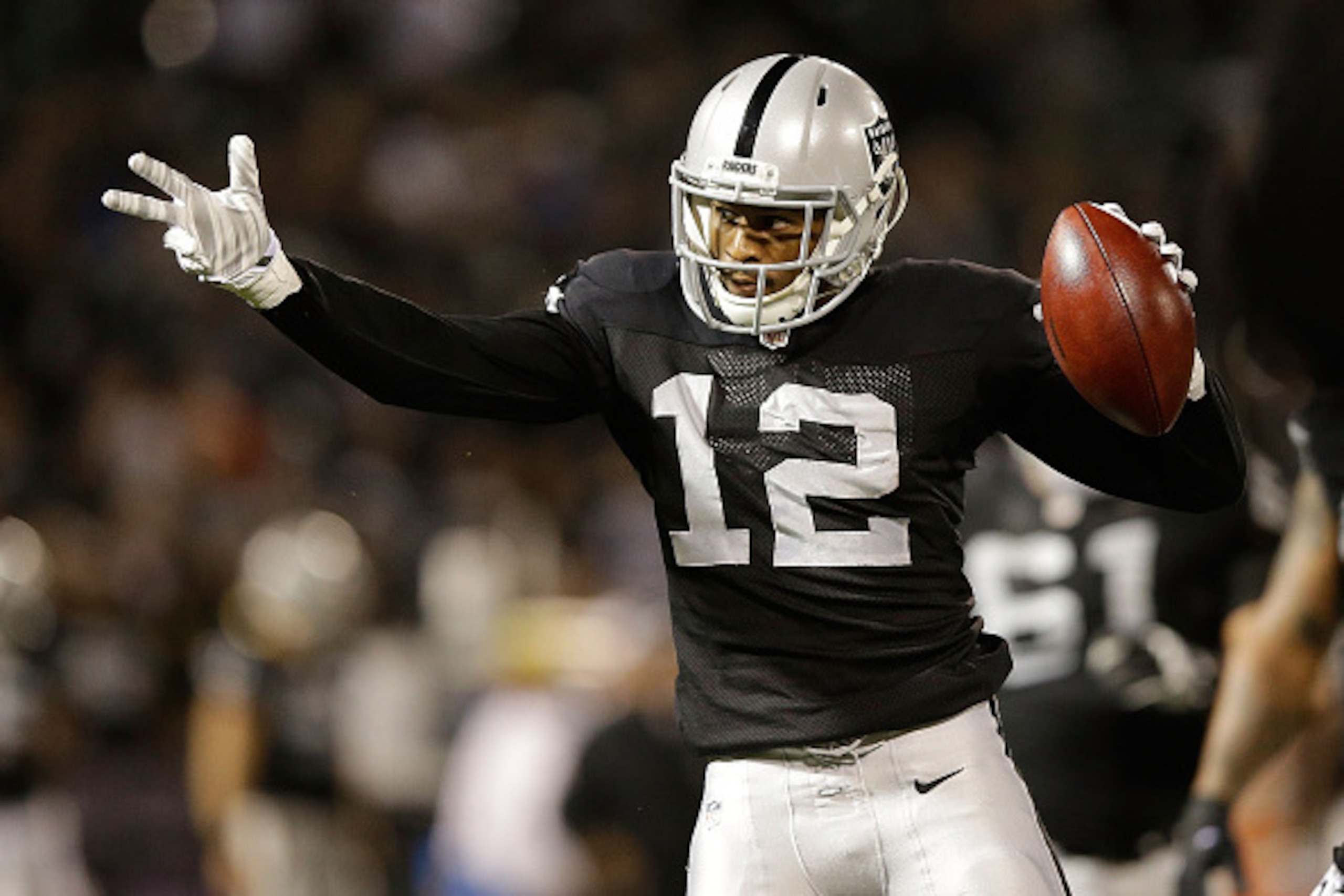 OAKLAND, CA - NOVEMBER 20:  Brice Butler #12 of the Oakland Raiders celebrates a first down in the first quarter of the game against the Kansas City Chiefs at O.co Coliseum on November 20, 2014 in Oakland, California.  (Photo by Ezra Shaw/Getty Images)