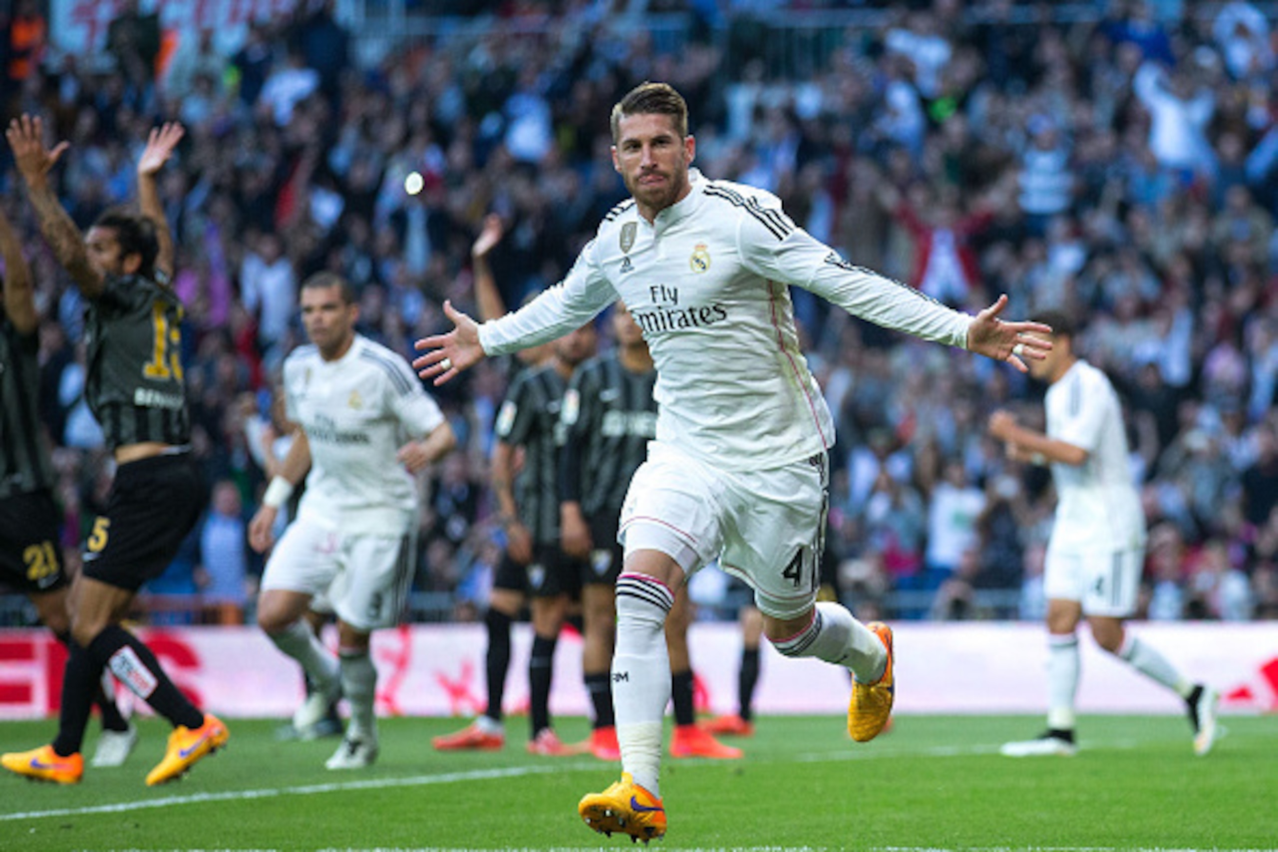 MADRID, SPAIN - APRIL 18: Sergio Ramos of Real Madrid CF celebrates scoring their opening goal during the La Liga match between Real Madrid CF and Malaga CF at Estadio Santiago Bernabeu on April 18, 2015 in Madrid, Spain.  (Photo by Gonzalo Arroyo Moreno/