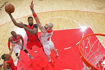 WASHINGTON, DC - APRIL 26:  Amir Johnson #15 of the Toronto Raptors shoots the ball in Game Four of the Eastern Conference Quarterfinals against the Washington Wizards during the 2015 NBA Playoffs on April 26, 2015 at the Verizon Center in Washington, DC.